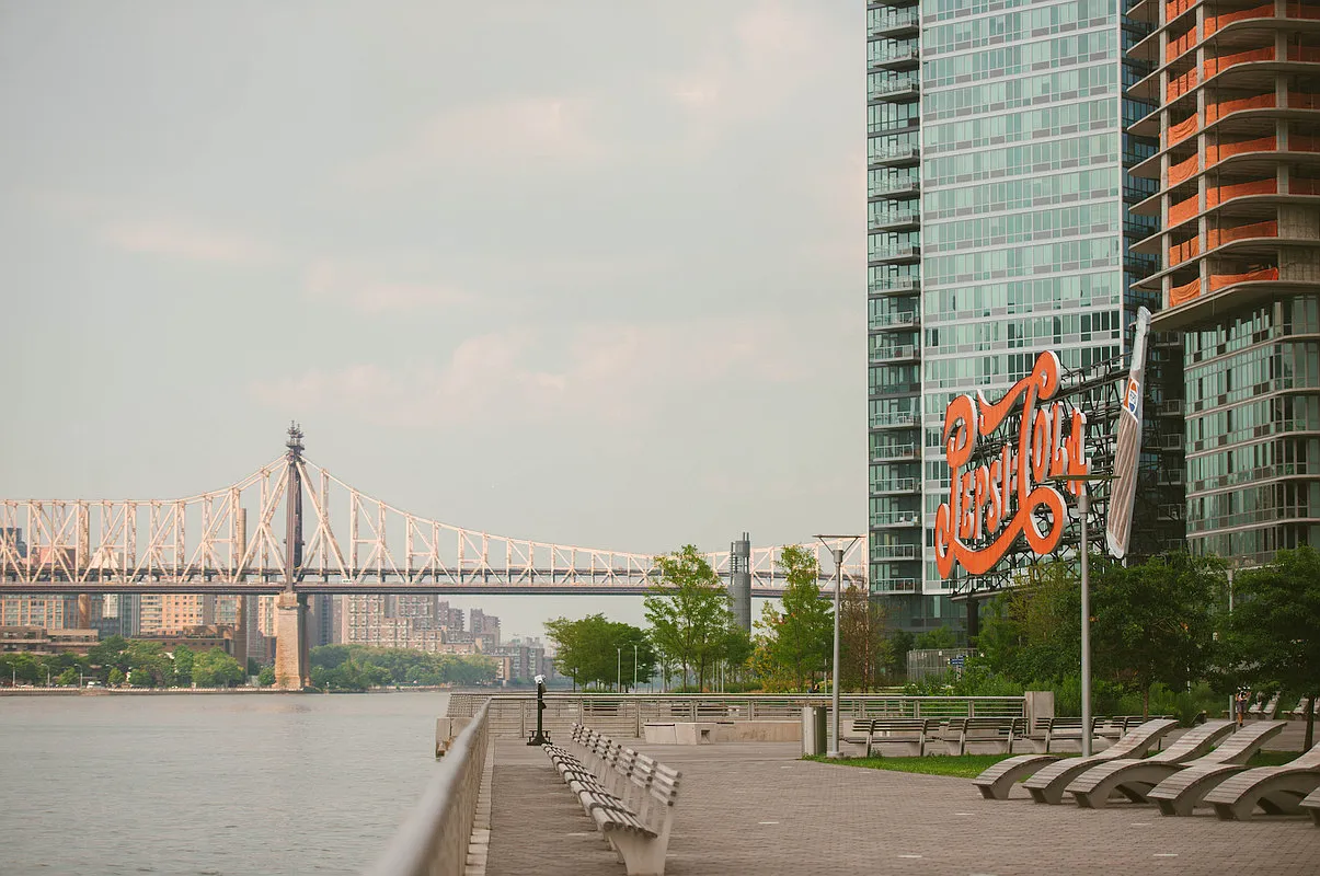 26-14 Jackson Avenue, Unit PHD Queens, NY 11101 - Photo 9 of 11 a view of street with tall buildings