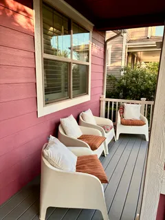 a balcony with hardwood
