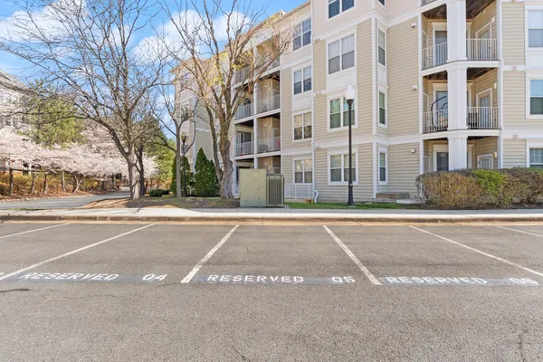 a view of open space with swimming pool and seating