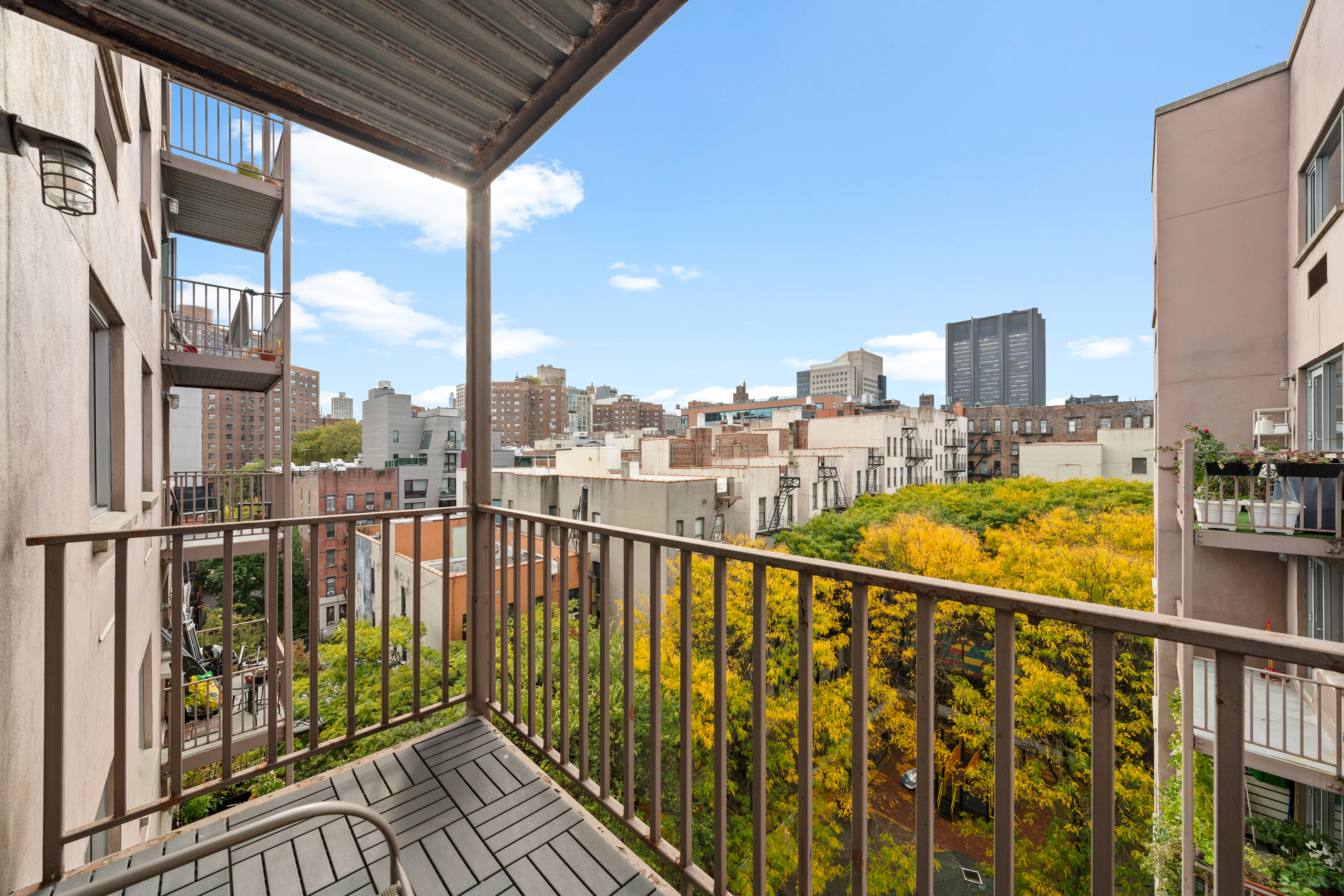1810 3rd Avenue, Unit A9B Manhattan, NY 10029 - Photo 7 of 16 a view of city from a balcony