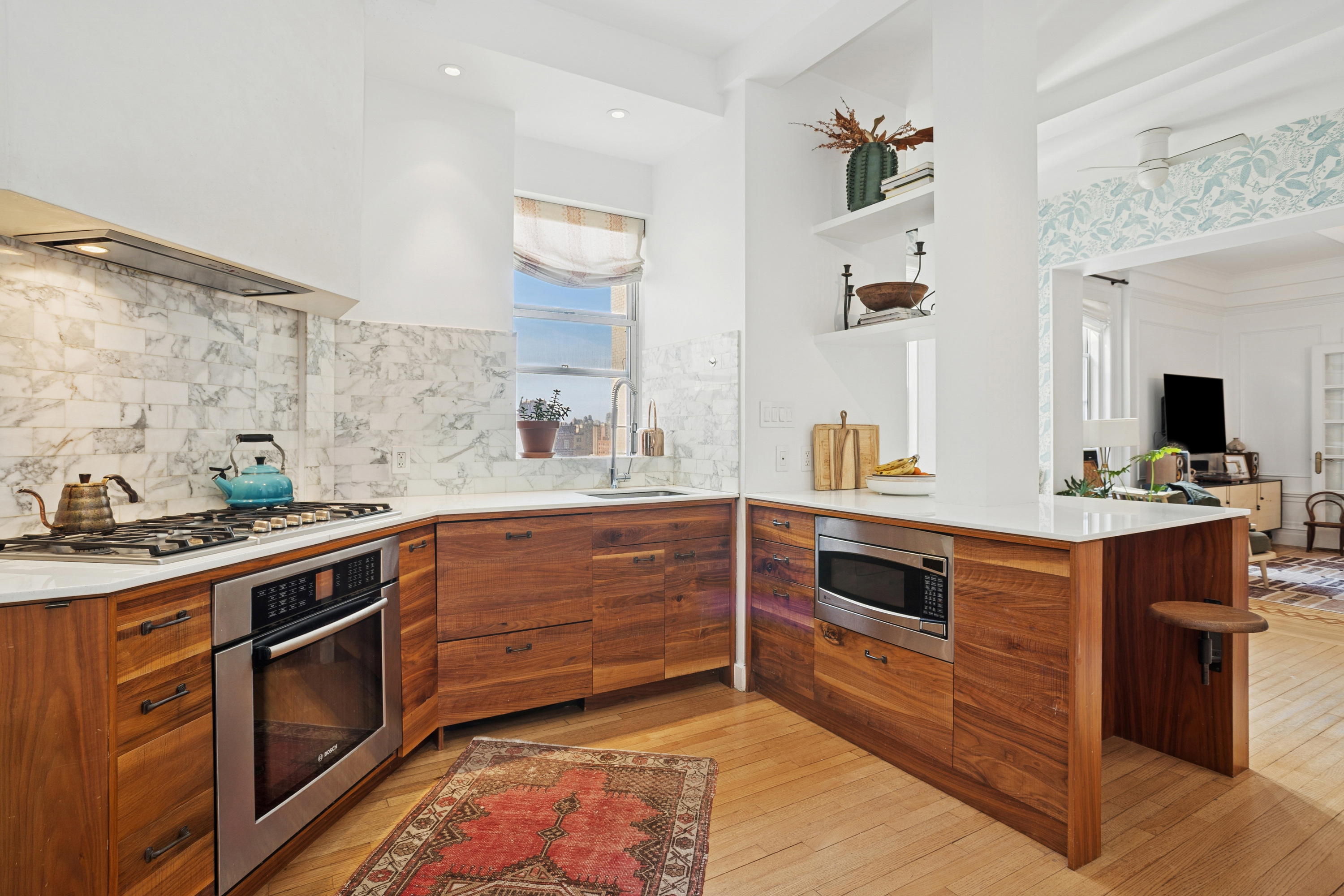 333 Central Park West, Unit 115 Manhattan, NY 10025 - Photo 11 of 13 a kitchen with a stove oven and sink