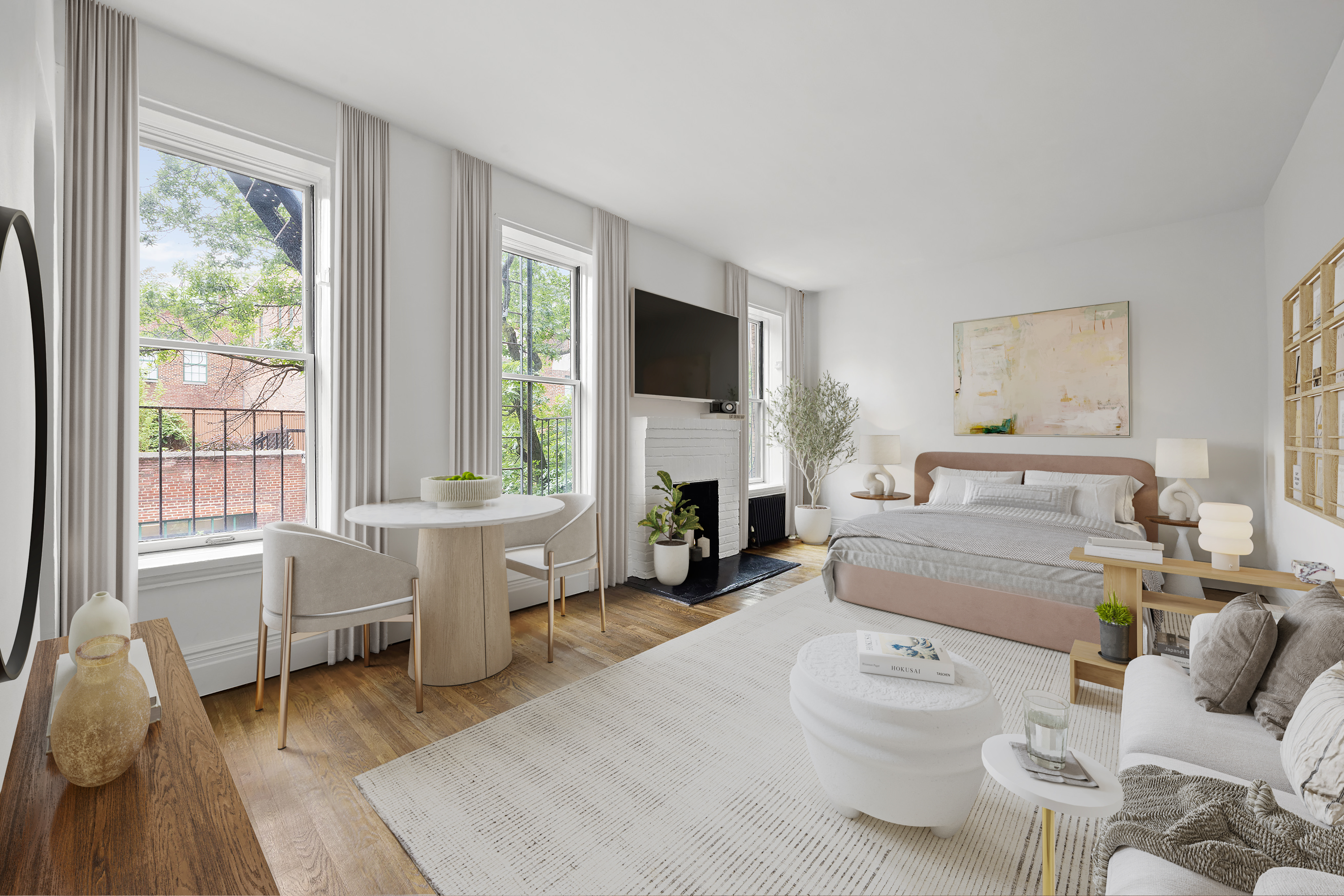 a living room with furniture and a fireplace