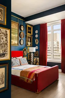 a bedroom with a bed and wall painting