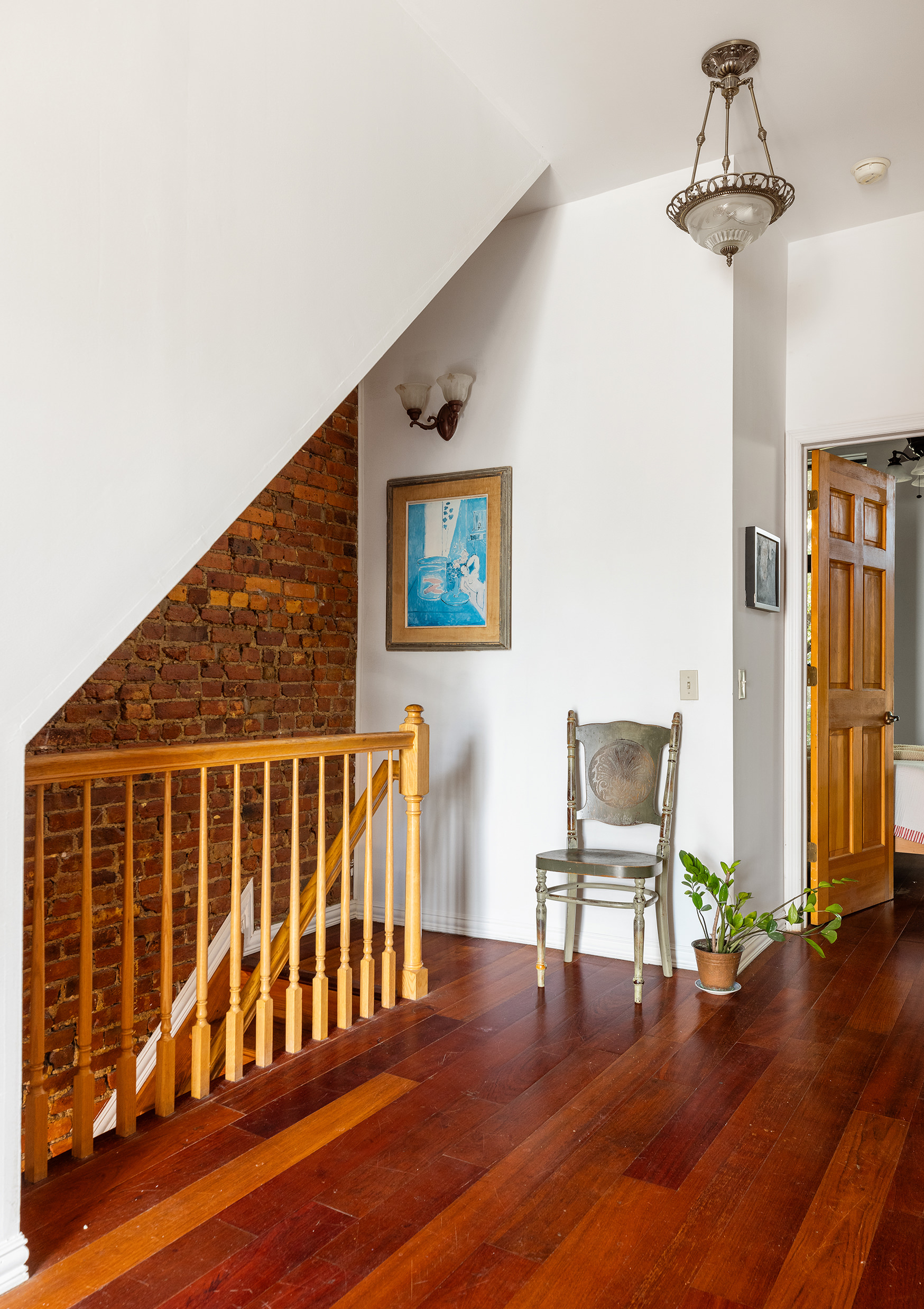 37 Quincy Street Brooklyn, NY 11238 - Photo 9 of 24 a view of a livingroom with wooden floor and furniture