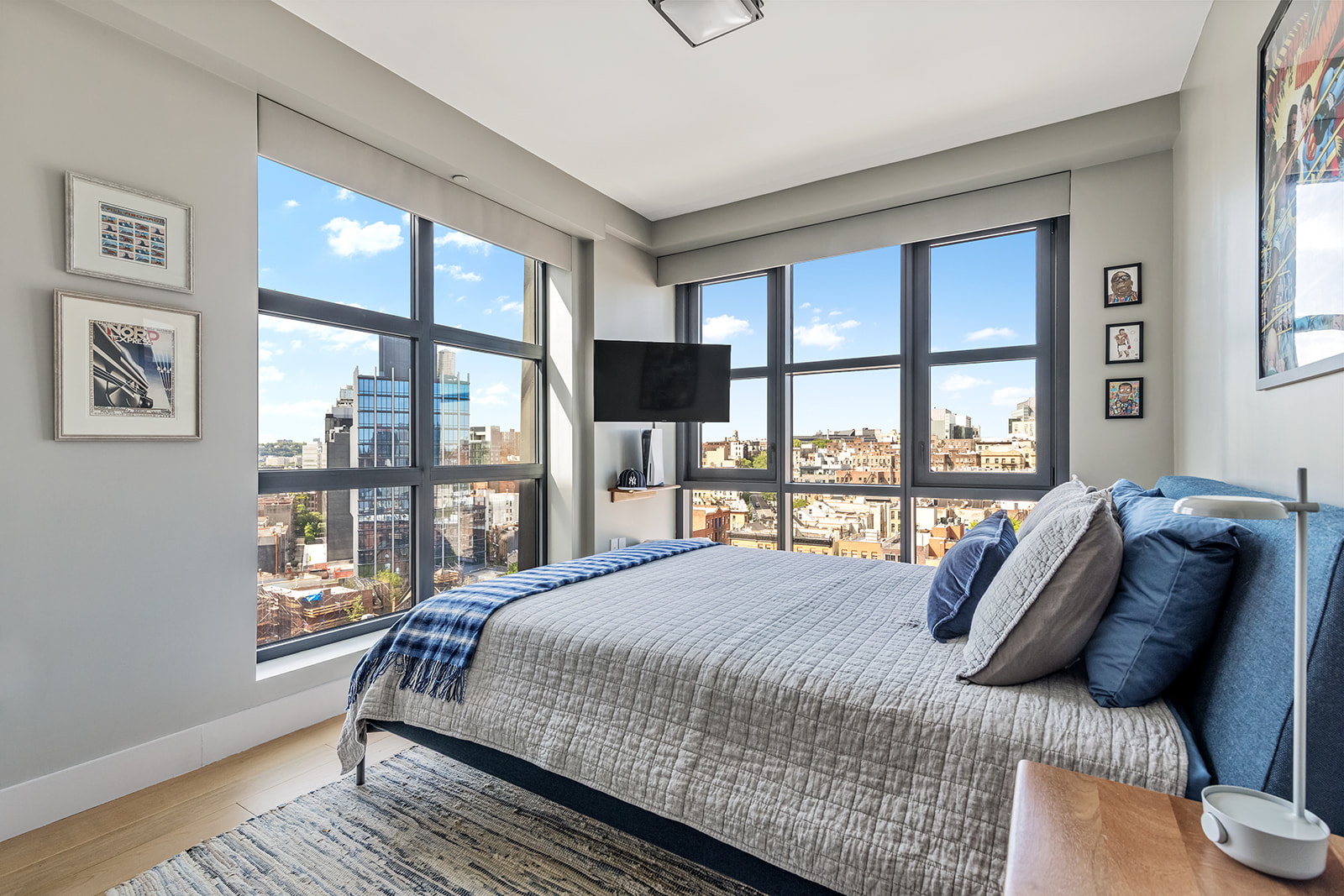 11 Hancock Place, Unit PH201 Manhattan, NY 10027 - Photo 5 of 10 a bedroom with a bed and glass window
