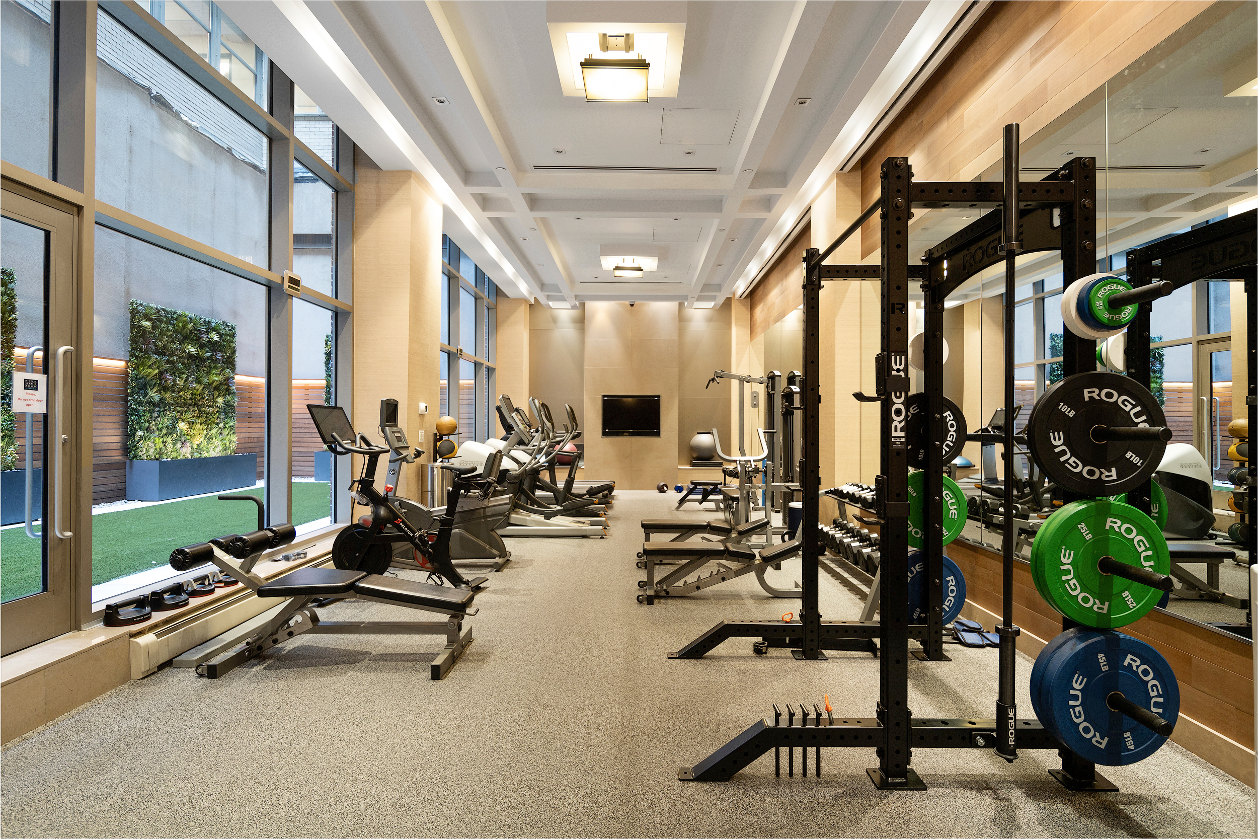 59 John Street, Unit PH1 Manhattan, NY 10038 - Photo 11 of 15 a living room with patio furniture and a large window