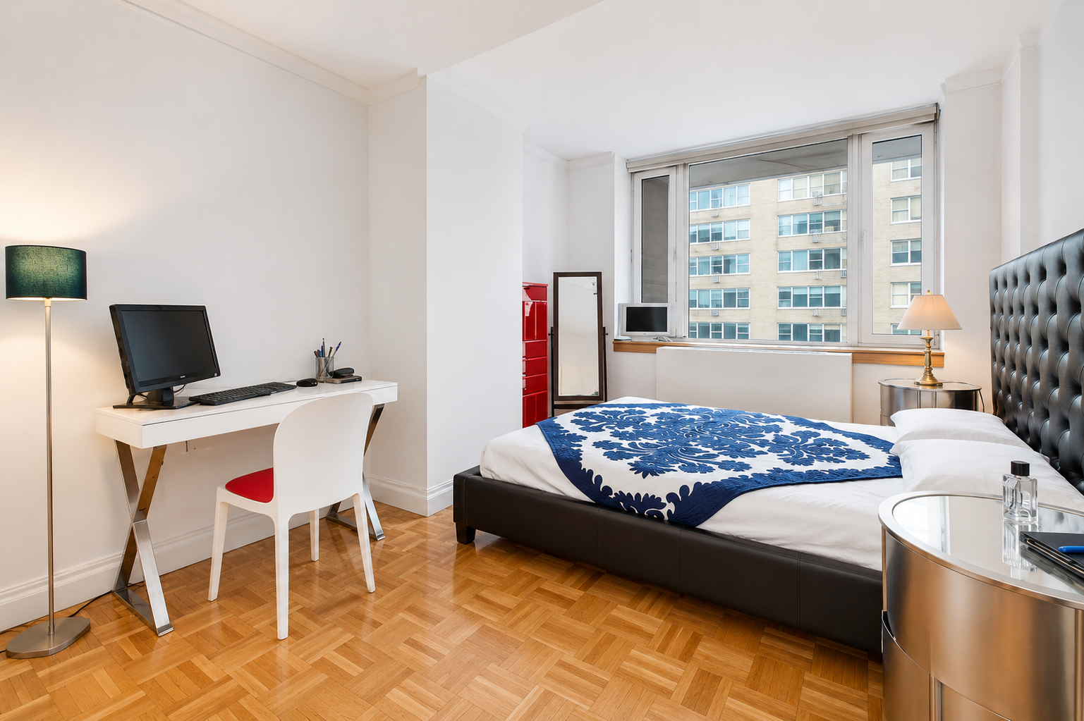 404 East 76th Street, Unit 6B Manhattan, NY 10021 - Photo 4 of 7 a bedroom with a bed and a desk