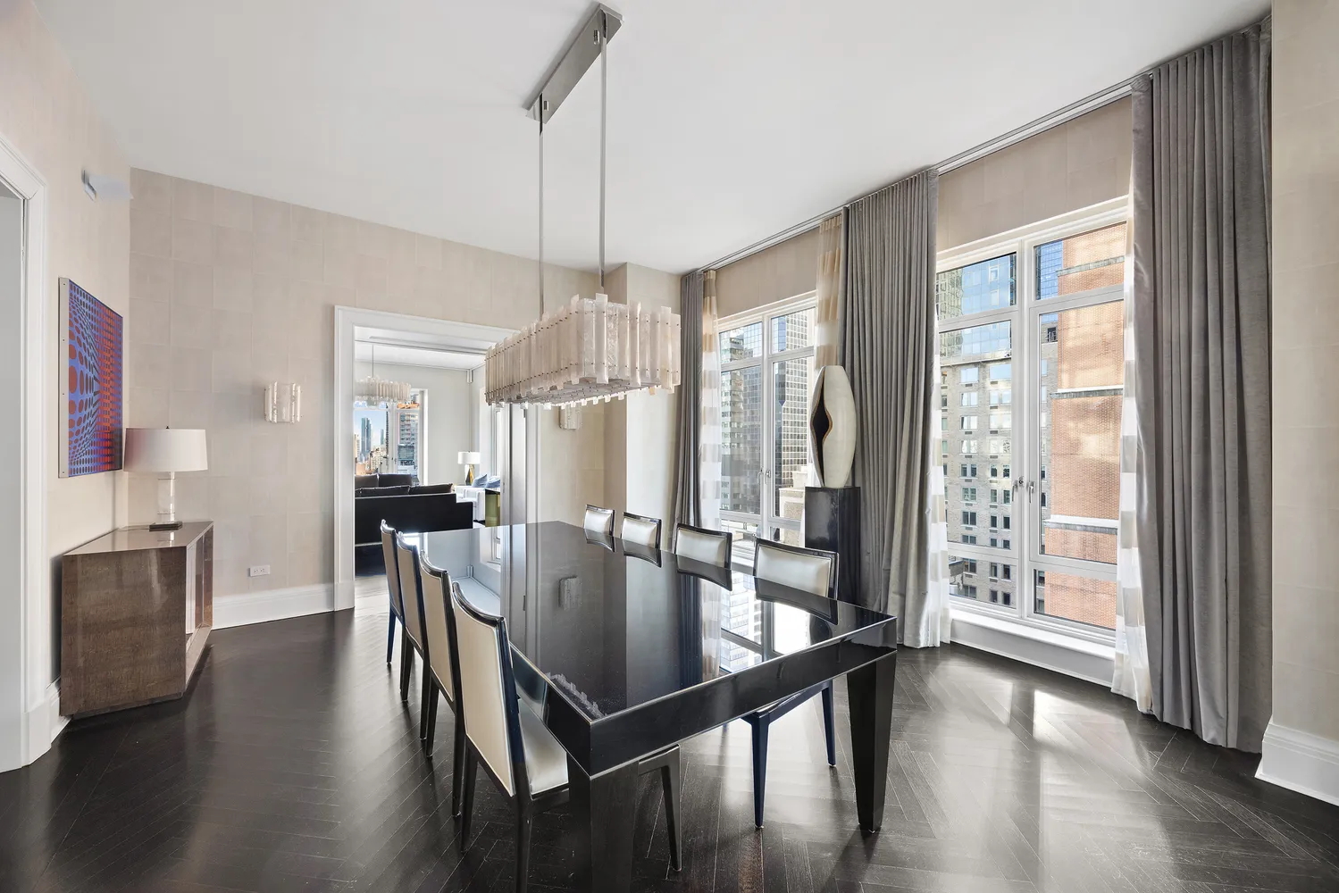 a view of a dining room with furniture window and wooden floor