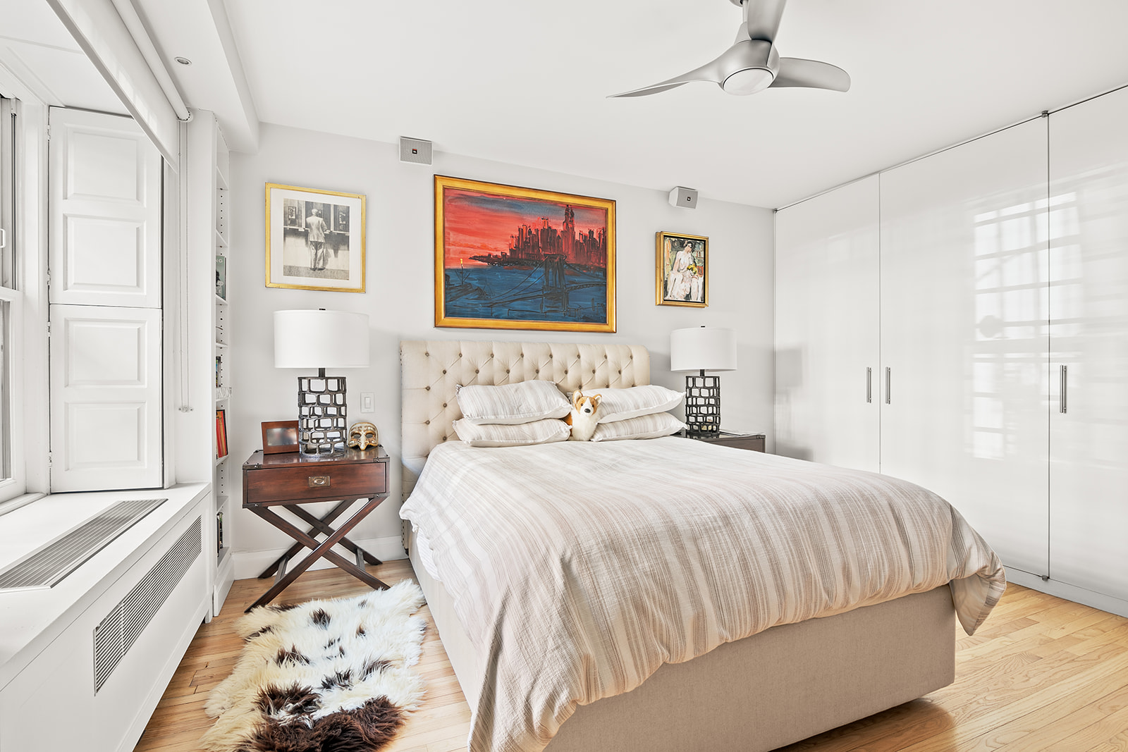 24 West 70th Street, Unit 1 Manhattan, NY 10023 - Photo 3 of 11 a bedroom with a bed and a window