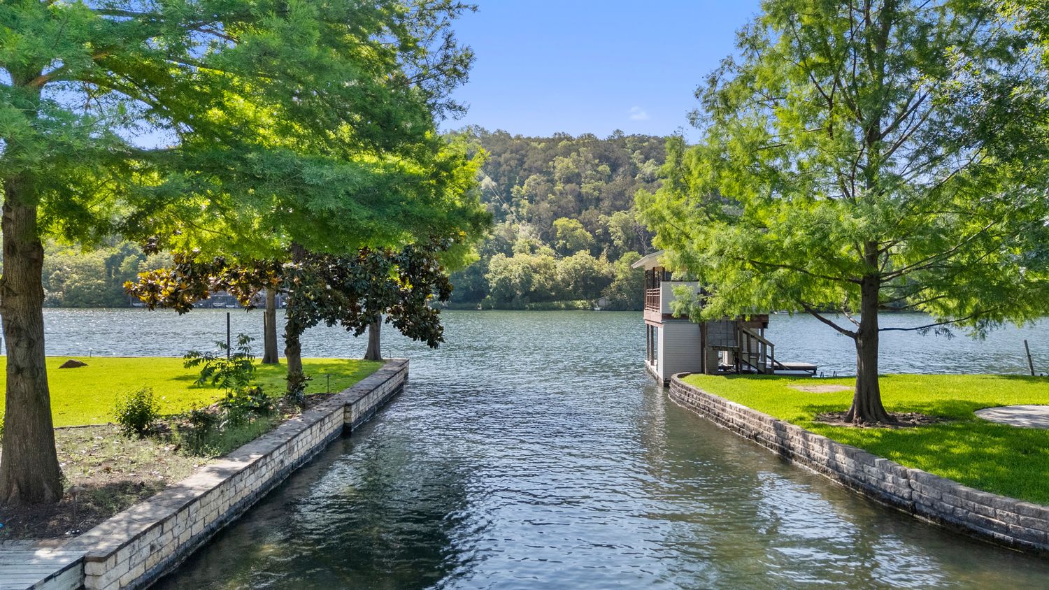 a view of a swimming pool with a patio