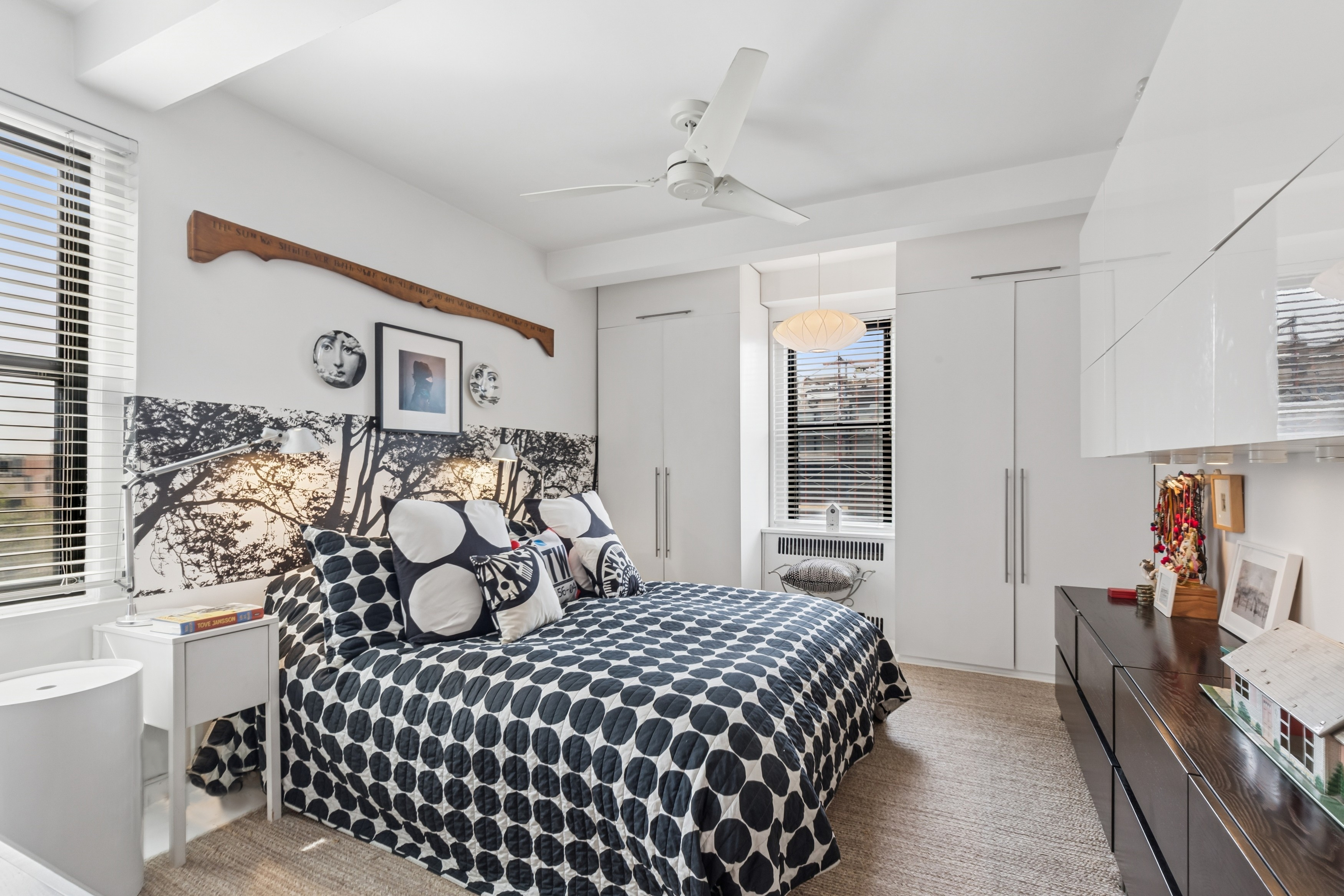 57 Park Terrace East, Unit B75 Manhattan, NY 10034 - Photo 7 of 18 a bedroom with a bed and wooden floor