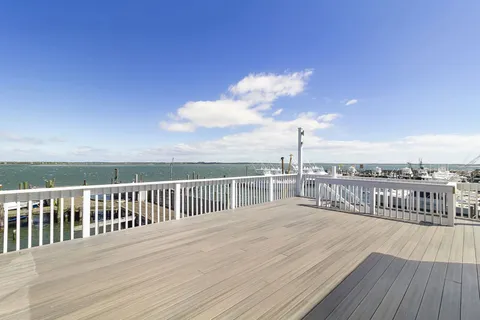 a view of balcony with furniture