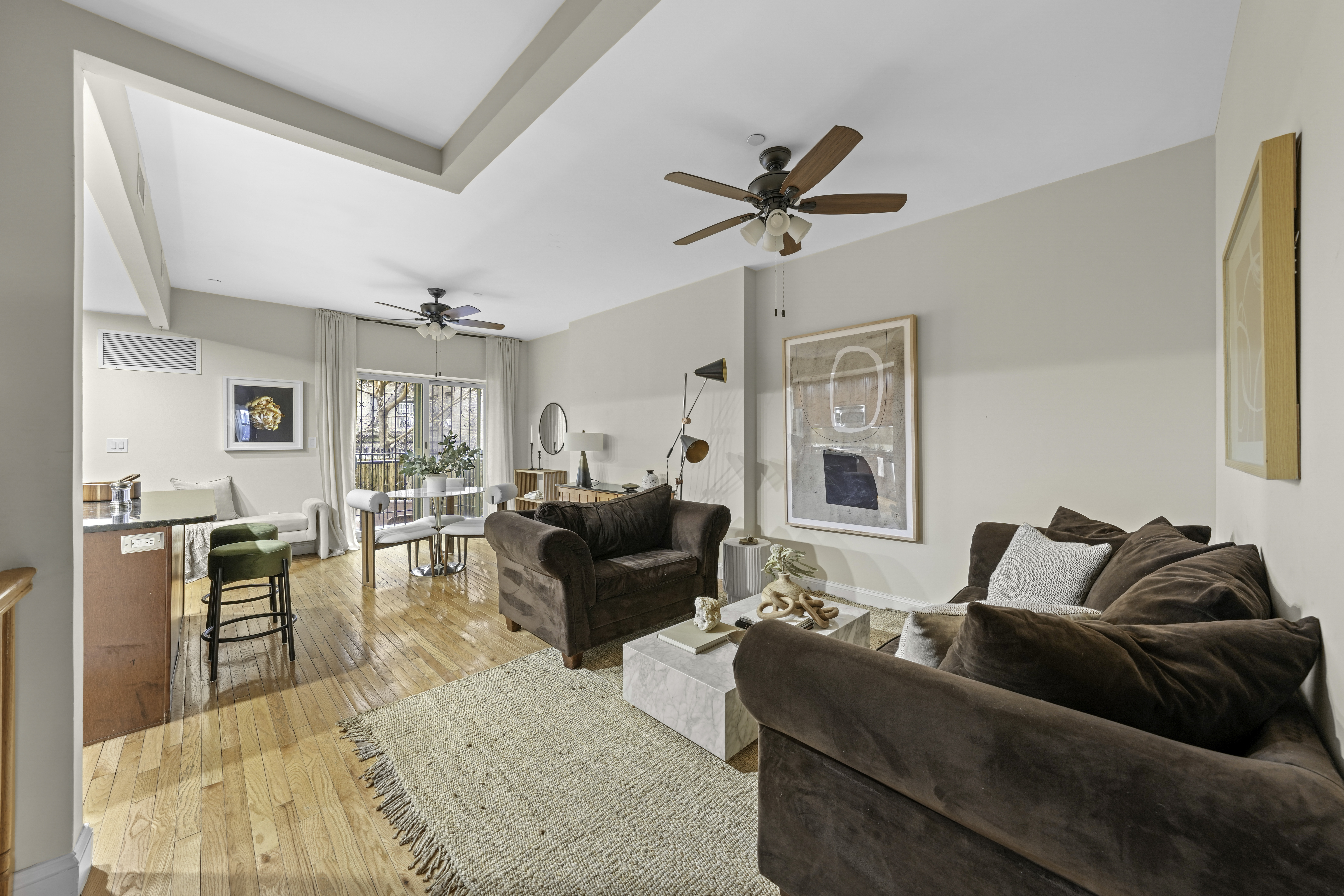 714 St Nicholas Avenue, Unit 1 Manhattan, NY 10031 - Photo 3 of 18 a living room with furniture and a window