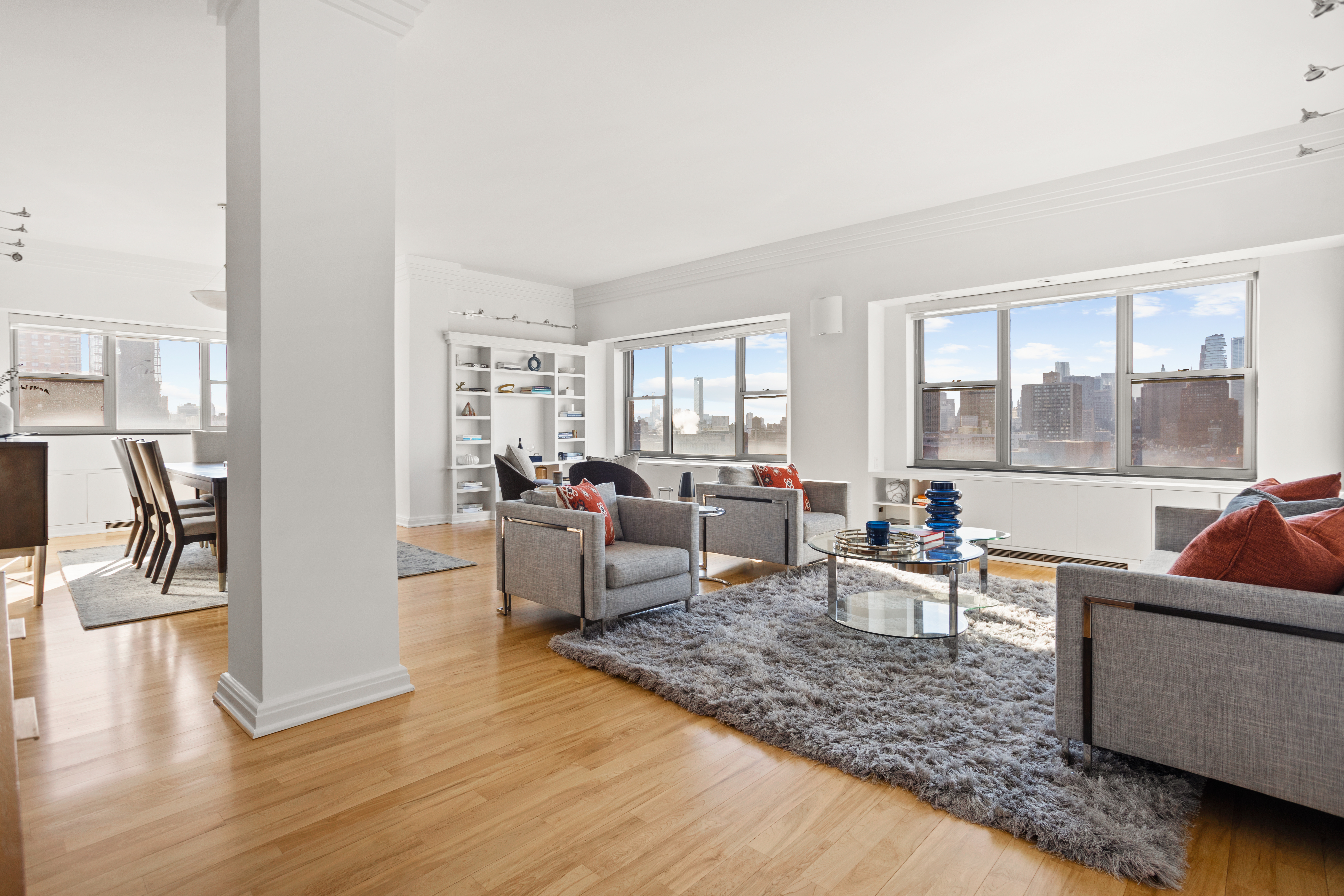2 5th Avenue, Unit PHDF Manhattan, NY 10011 - Photo 2 of 24 a living room with furniture and a large window