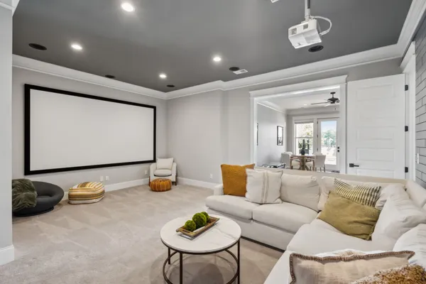 a living room with furniture or couch and a wooden floor