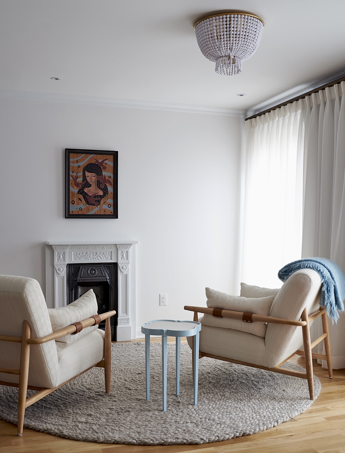 435 Clinton Avenue Brooklyn, NY 11238 - Photo 14 of 27 a living room with furniture and a fireplace