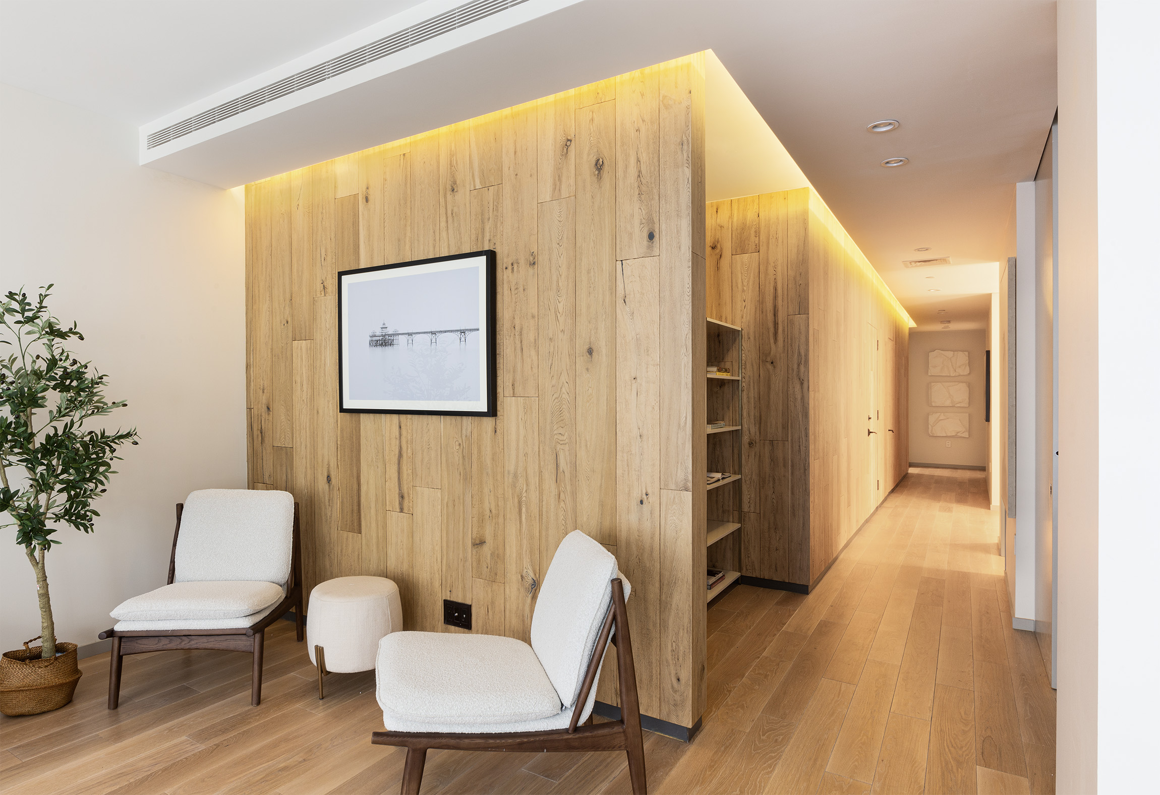 29 West 21st Street, Unit 5 Manhattan, NY 10010 - Photo 14 of 20 a view of a hallway with furniture and wooden floor