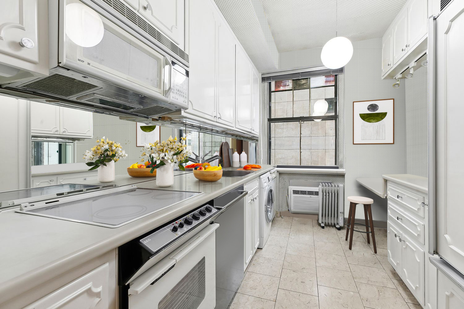 111 East 56th Street, Unit 1005 Manhattan, NY 10022 - Photo 5 of 9 a kitchen that has a lot of cabinets in it