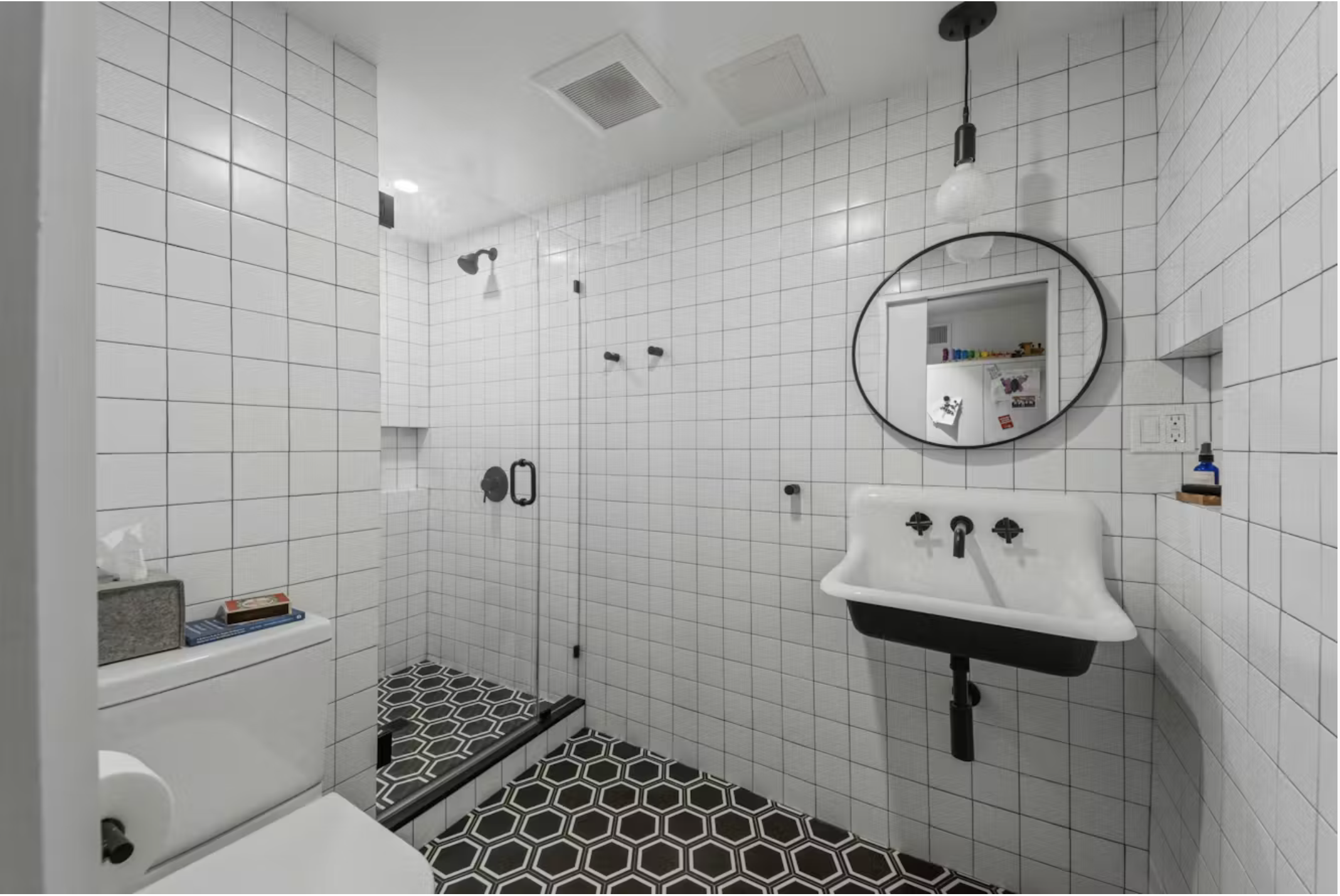 304 Warren Street, Unit 1 Brooklyn, NY 11201 - Photo 11 of 16 a bathroom with a sink toilet and shower