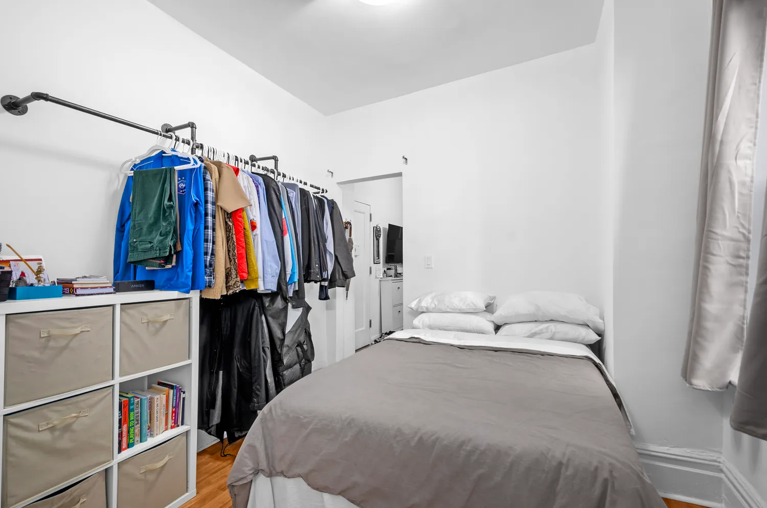 a bedroom with a bed and a closet