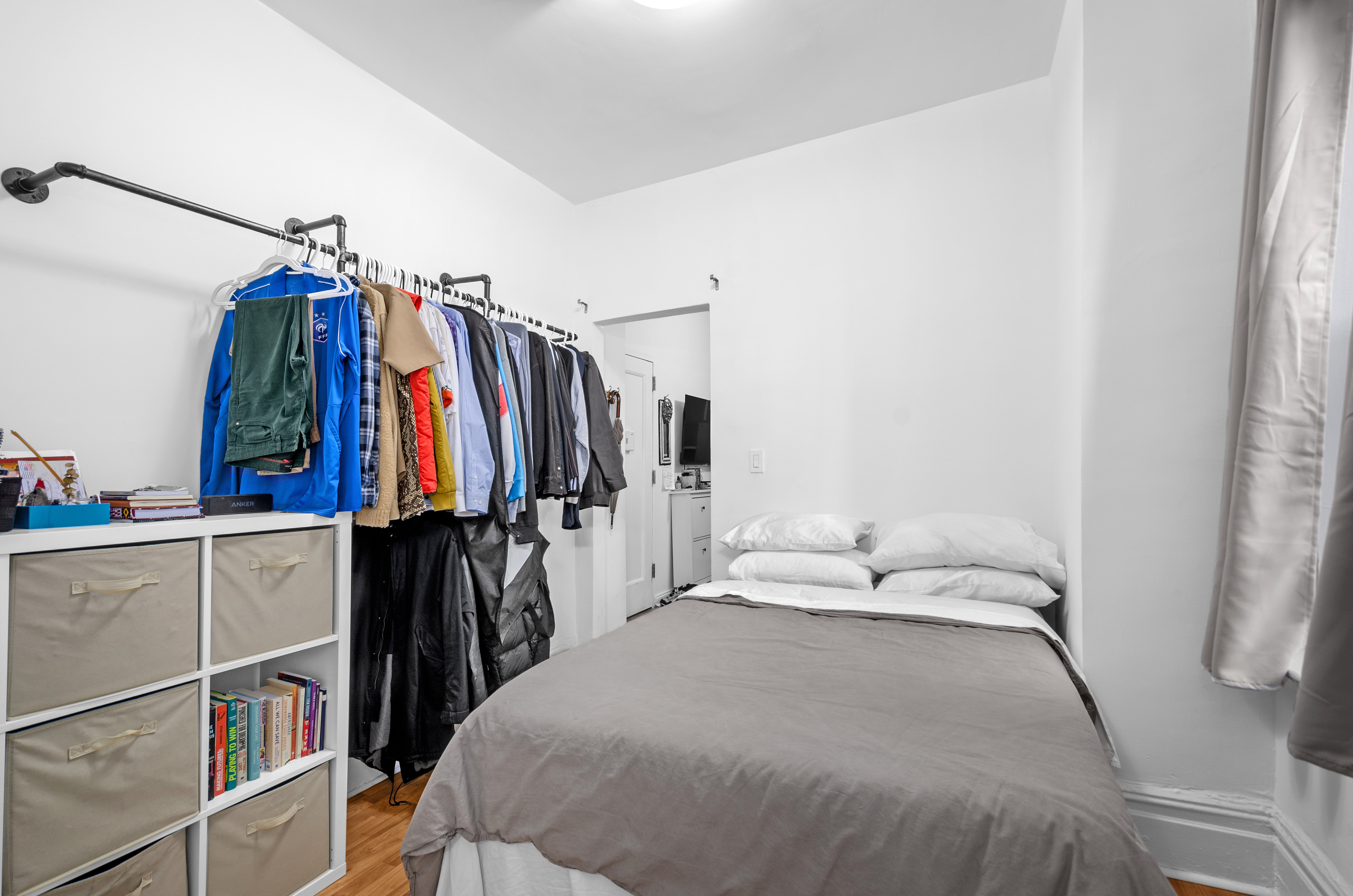 465 Eastern Parkway, Unit D Brooklyn, NY 11216 - Photo 3 of 7 a bedroom with a bed and a closet