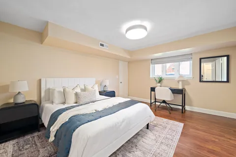 a view of swimming pool with outdoor seating and lake view