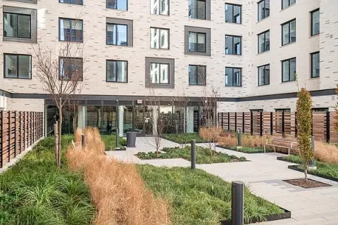 a garden view with a seating space