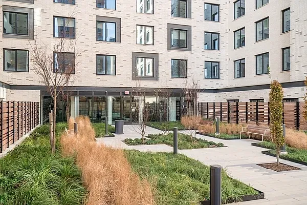 a garden view with a seating space