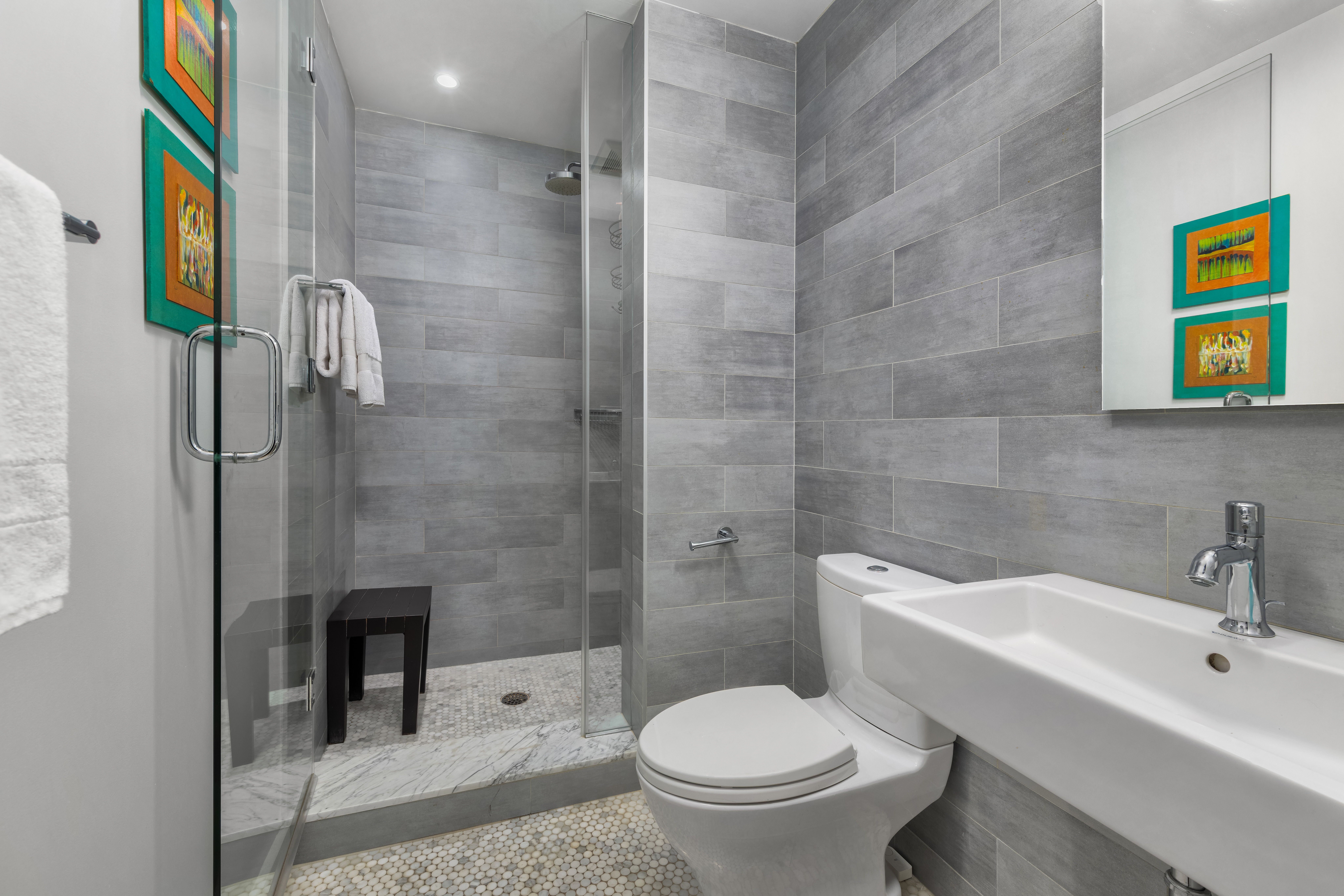 159 6th Avenue, Unit TRIPLEX Brooklyn, NY 11217 - Photo 10 of 19 a bathroom with a sink toilet and shower
