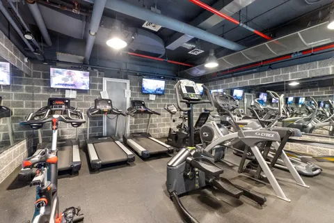 a view of a room with gym equipment