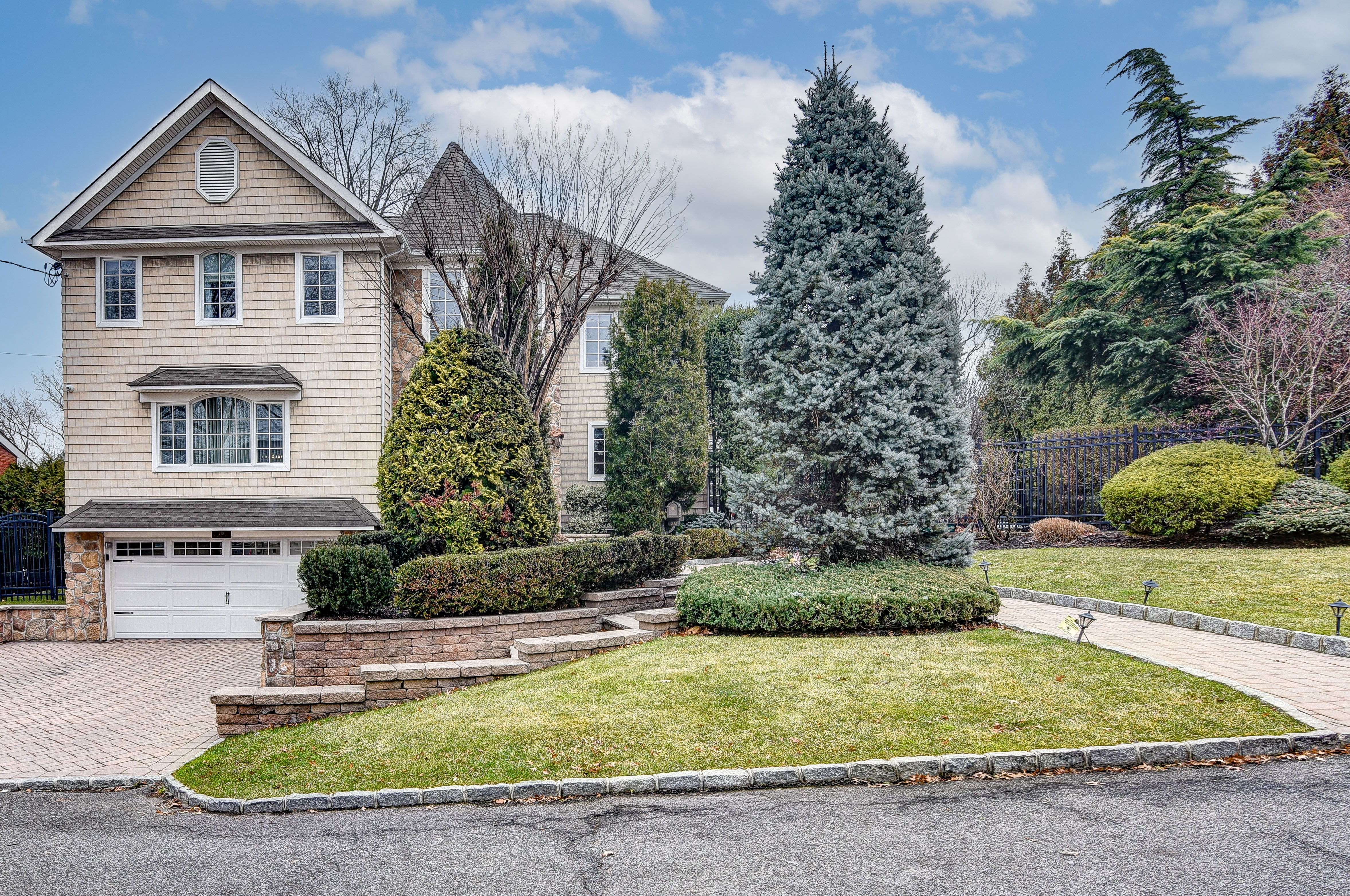 215 Lawrence Avenue Staten Island, NY 10310 - Photo 35 of 45 a front view of a house with a yard