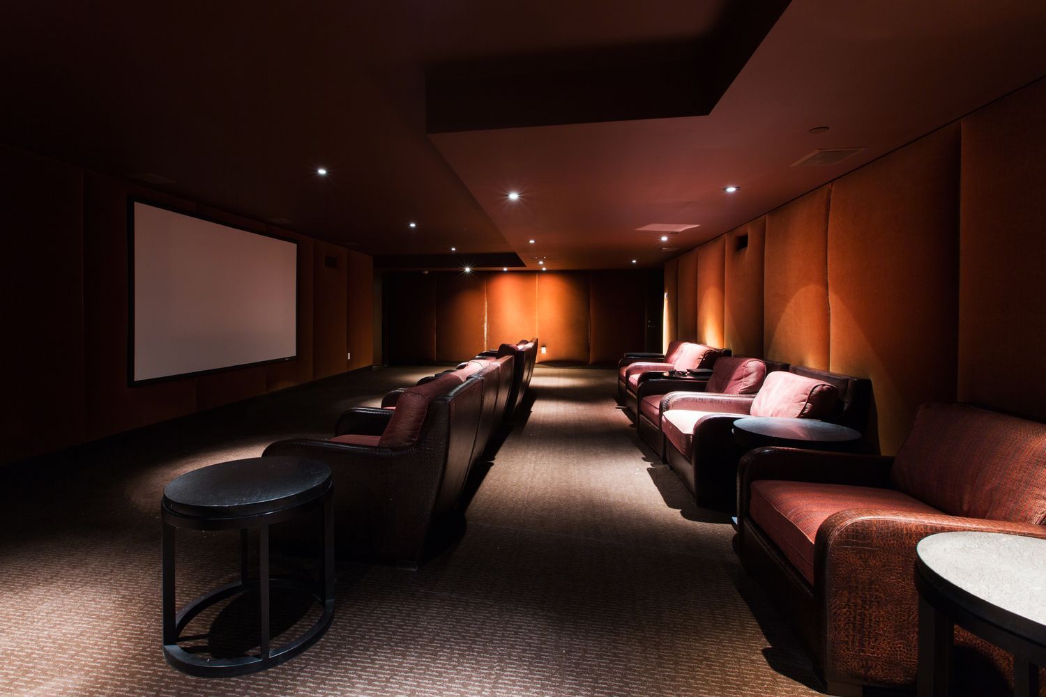 46-30 Center Boulevard, Unit 1209 Queens, NY 11109 - Photo 18 of 26 a media room with lots of chairs and a projector screen