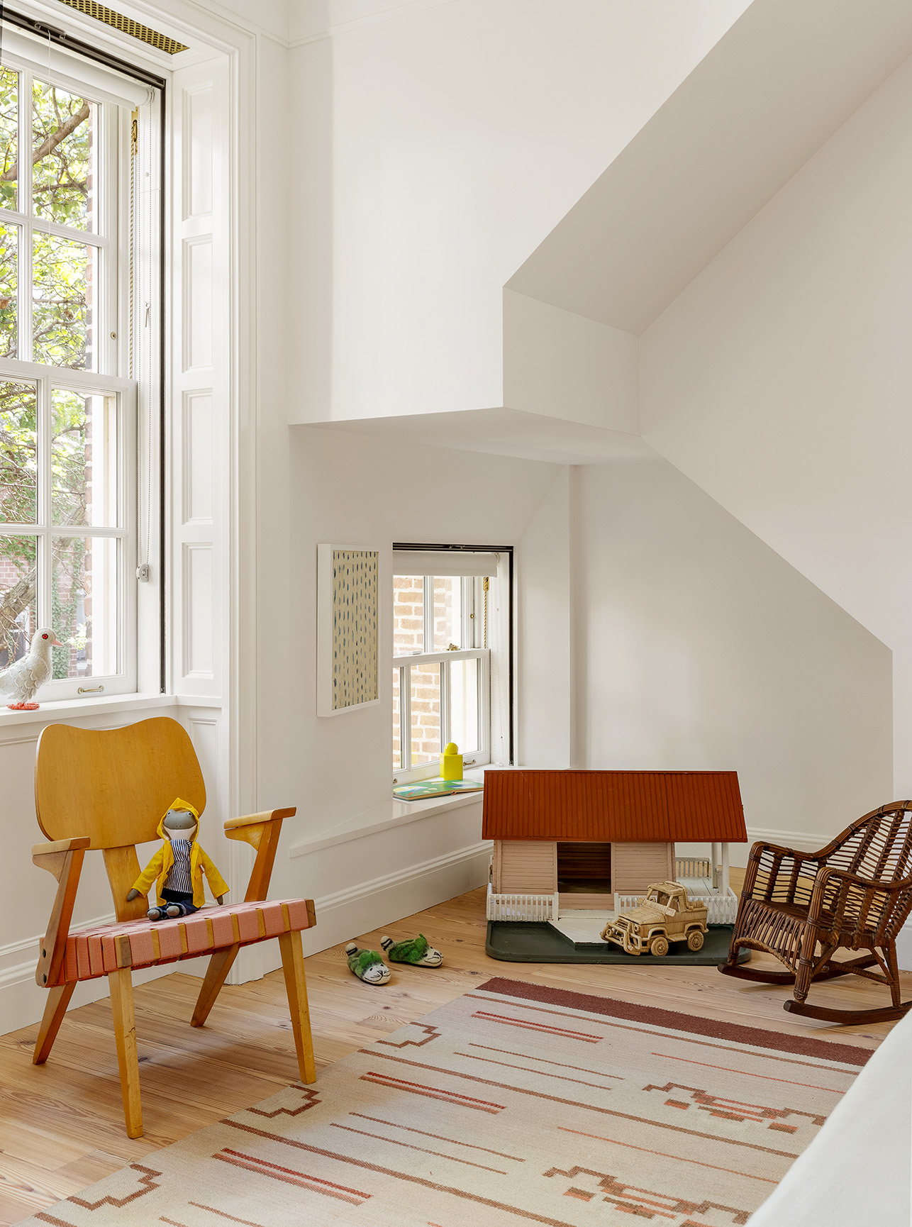 37 Harrison Street Manhattan, NY 10013 - Photo 18 of 26 a living room with furniture and a window