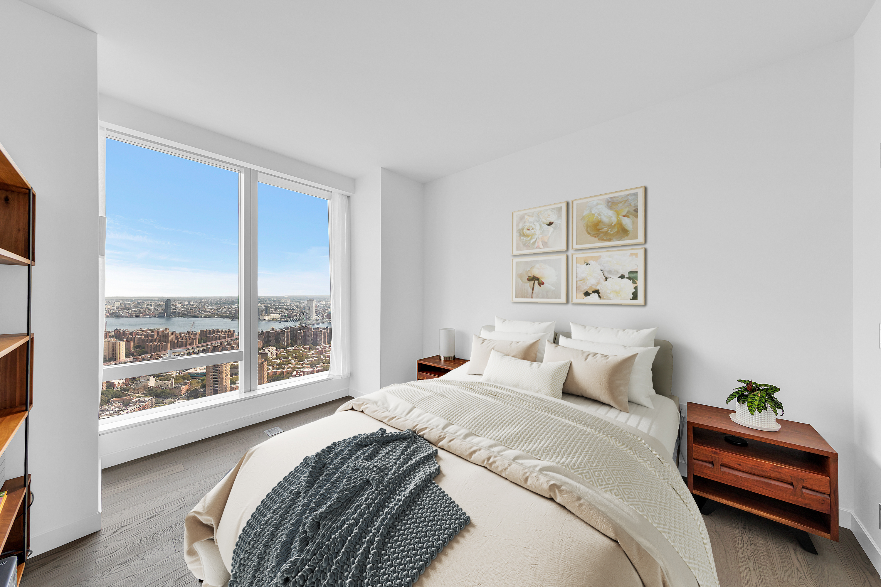 252 South Street, Unit 64G Manhattan, NY 10002 - Photo 6 of 24 a bedroom with a bed and a large window