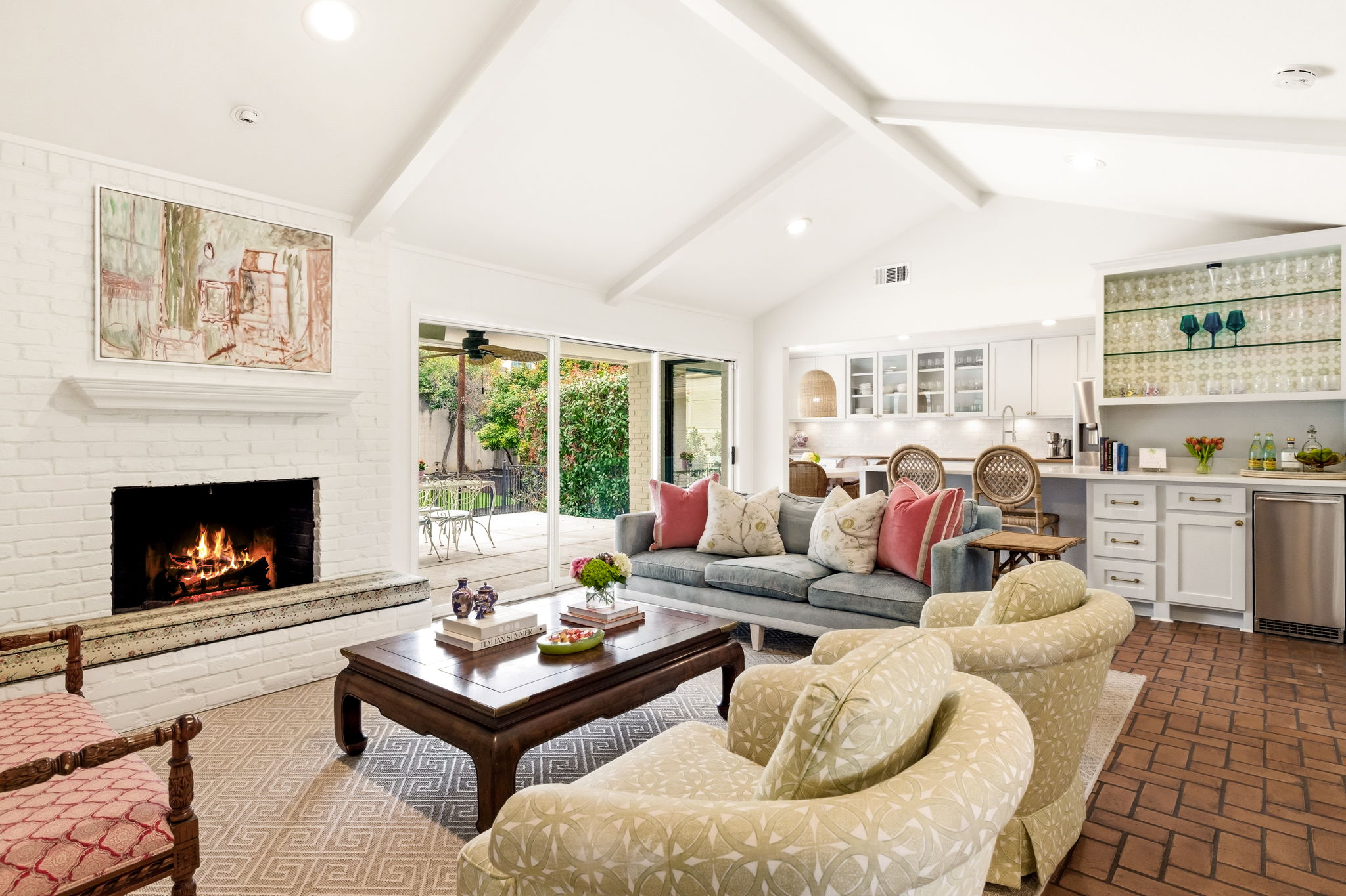 5765 Stonegate Road Dallas, TX 75209 - Photo 11 of 37 a living room with furniture fireplace and a large window