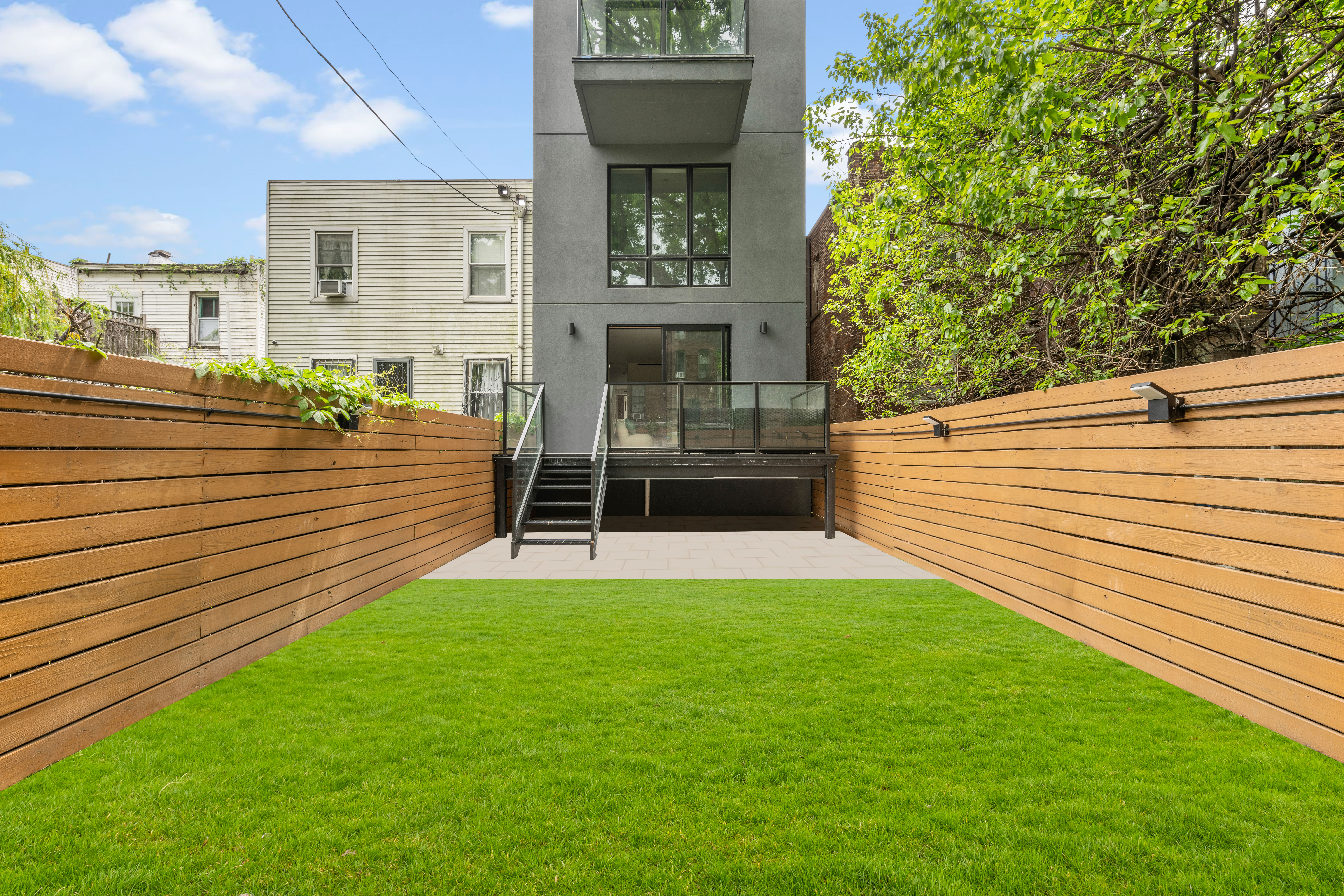 545 Lexington Avenue, Unit 1 Brooklyn, NY 11221 - Photo 14 of 19 a view of a backyard with sitting area