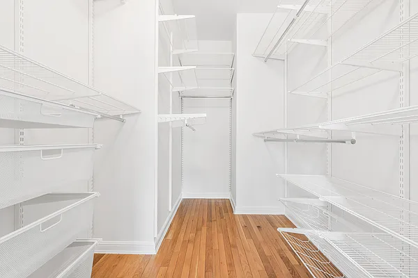 252 7th Avenue, Unit 10I Manhattan, NY 10001 - Photo 9 of 25 a view of bathroom and wooden floor