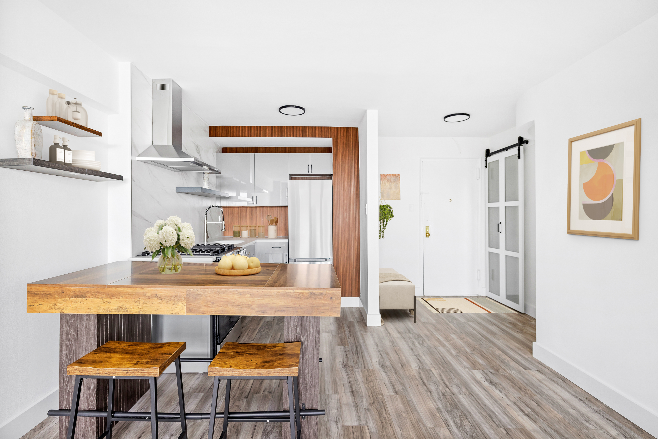 495 East 7th Street, Unit 7D Brooklyn, NY 11218 - Photo 3 of 9 a kitchen with a table and chairs