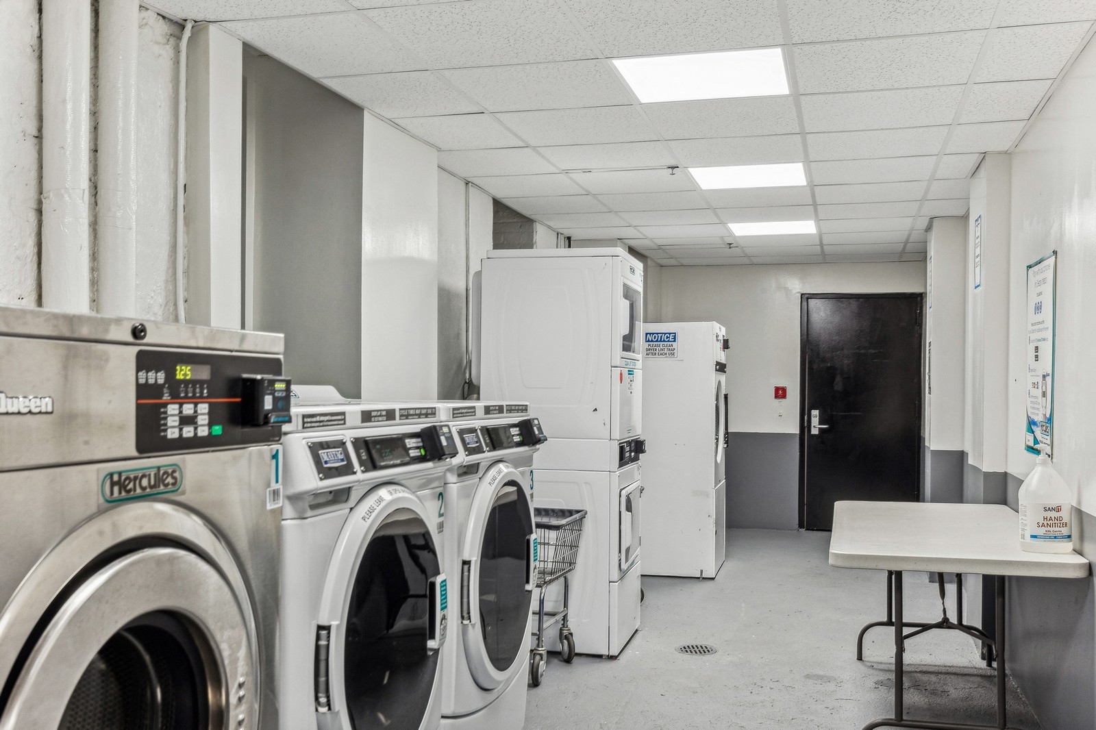 307 West 111th Street, Unit 2R Manhattan, NY 10026 - Photo 6 of 16 a view of a hallway with washer and dryer