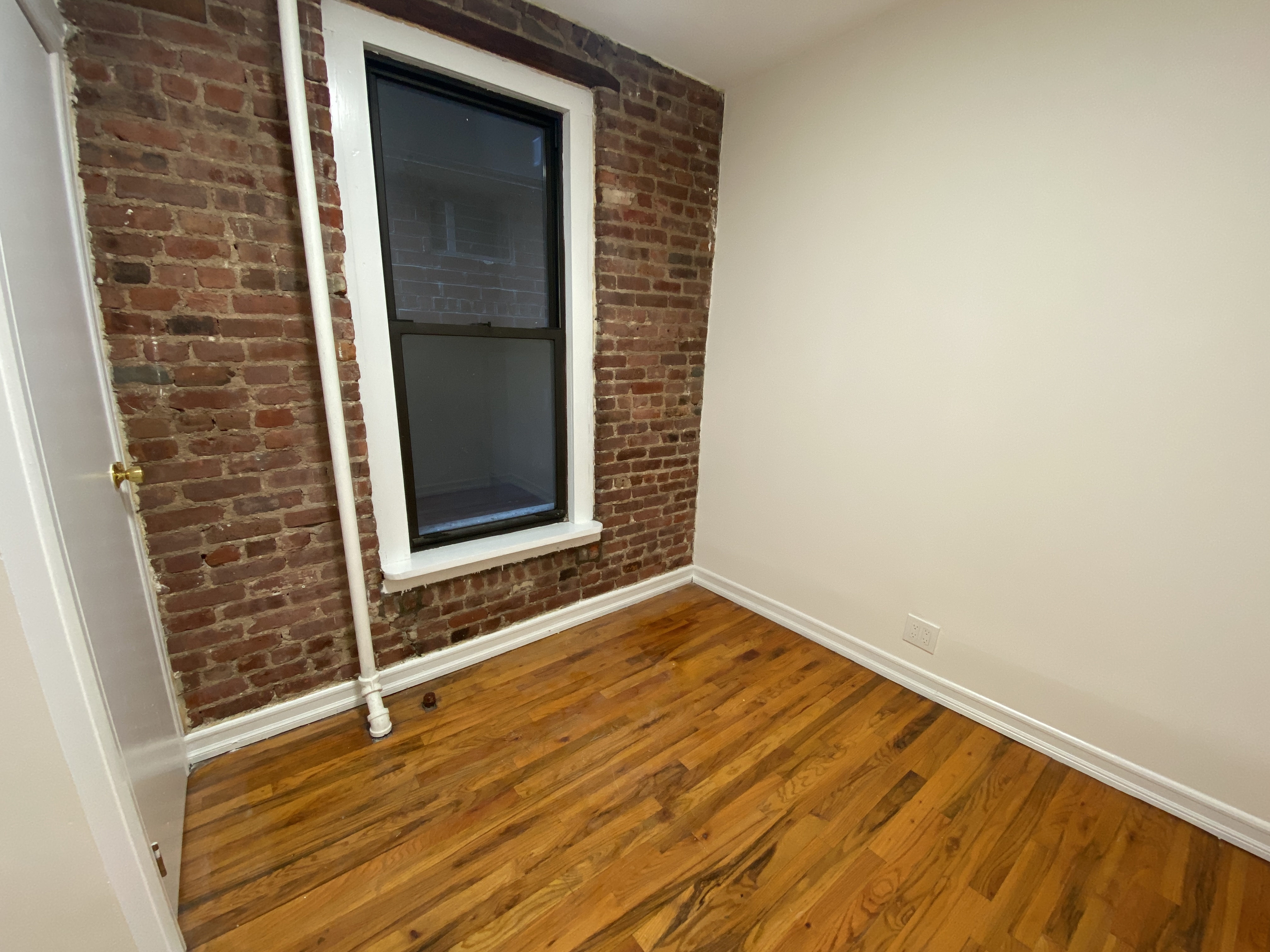 435 East 75th Street, Unit 10 Manhattan, NY 10021 - Photo 4 of 6 a view of front door of a house