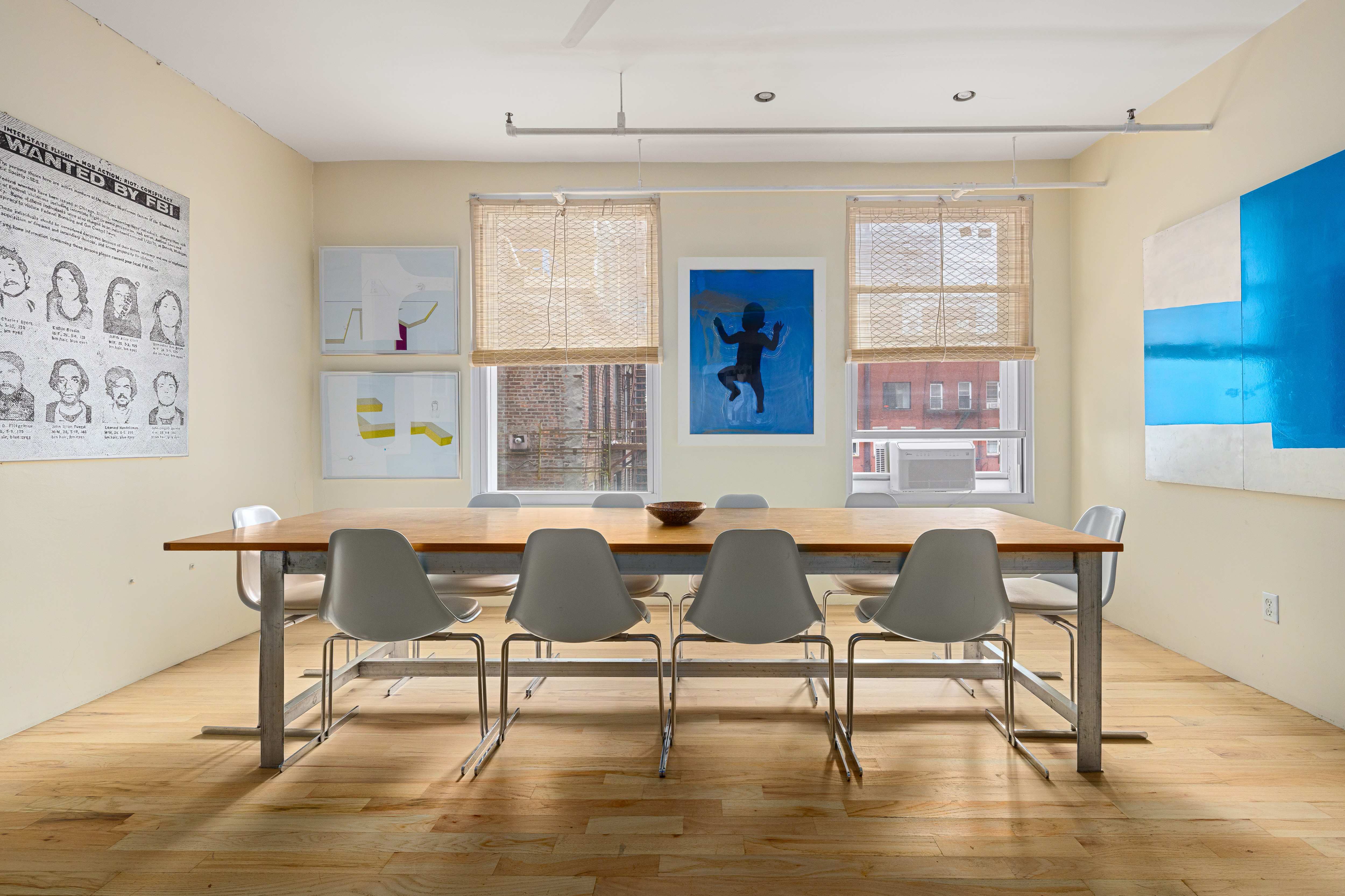 191 Chrystie Street, Unit 5R Manhattan, NY 10002 - Photo 5 of 16 a view of a dining room with furniture window and wooden floor