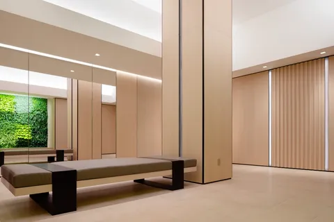 a view of a livingroom with furniture and windows