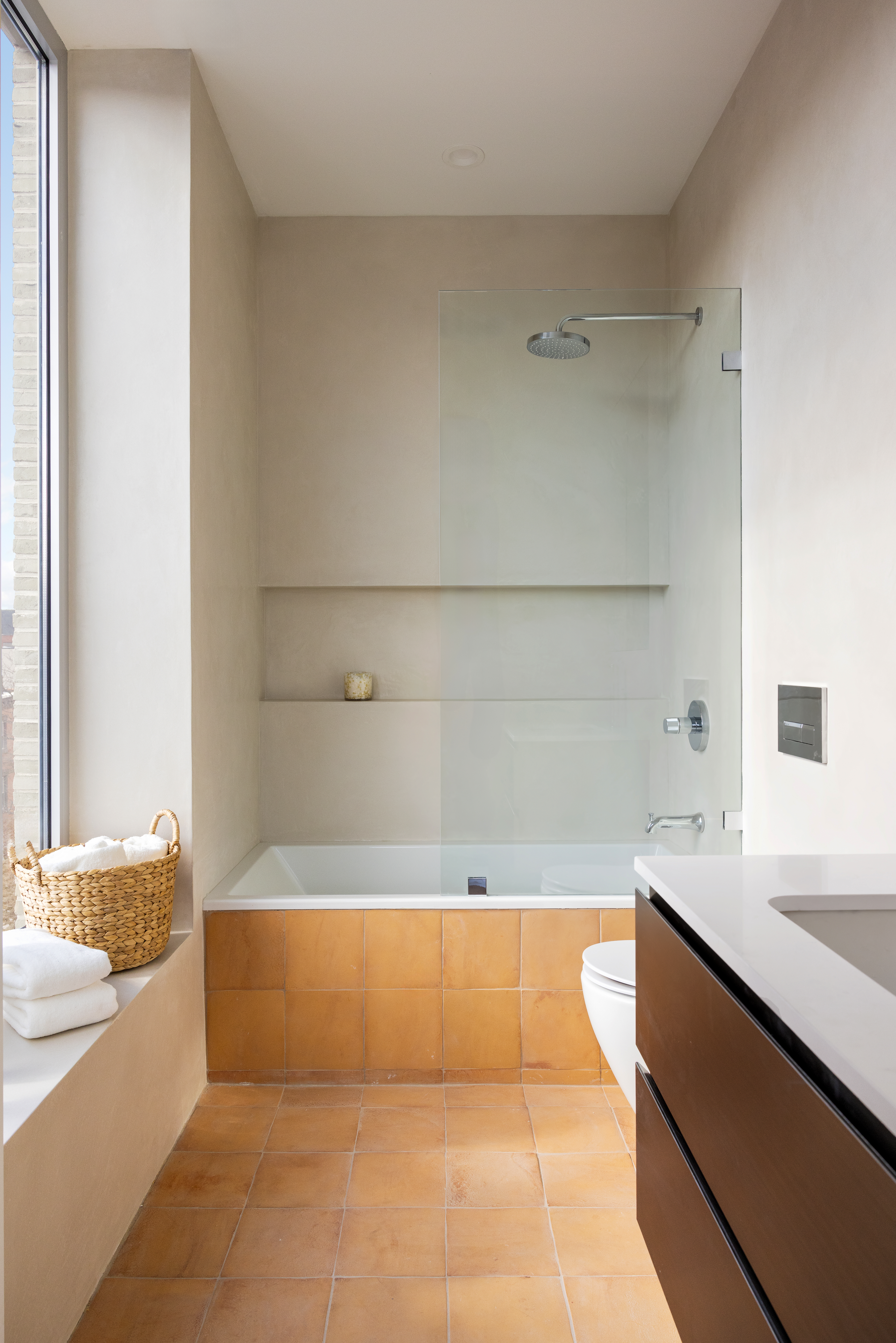 276 Berry Street Brooklyn, NY 11249 - Photo 25 of 36 a bathroom with a bathtub and a sink