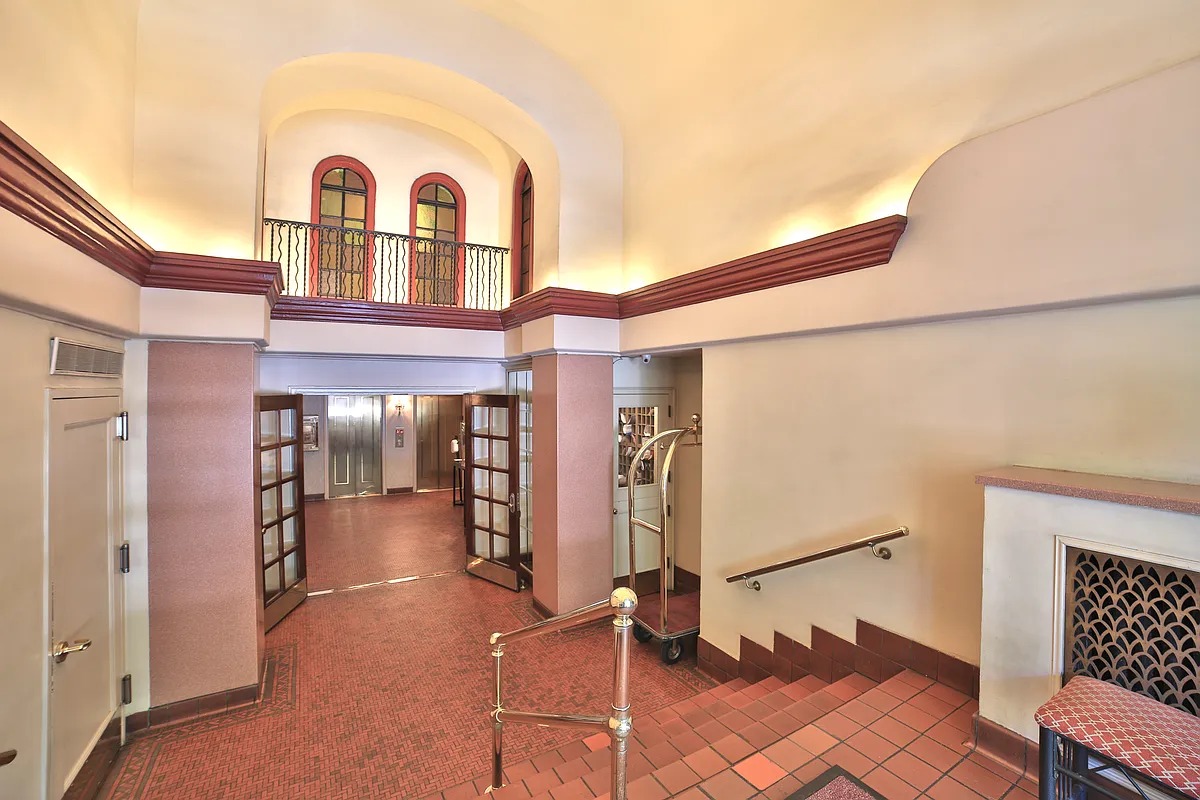 457 West 57th Street, Unit 912 Manhattan, NY 10019 - Photo 5 of 11 a view of a brick house with many windows