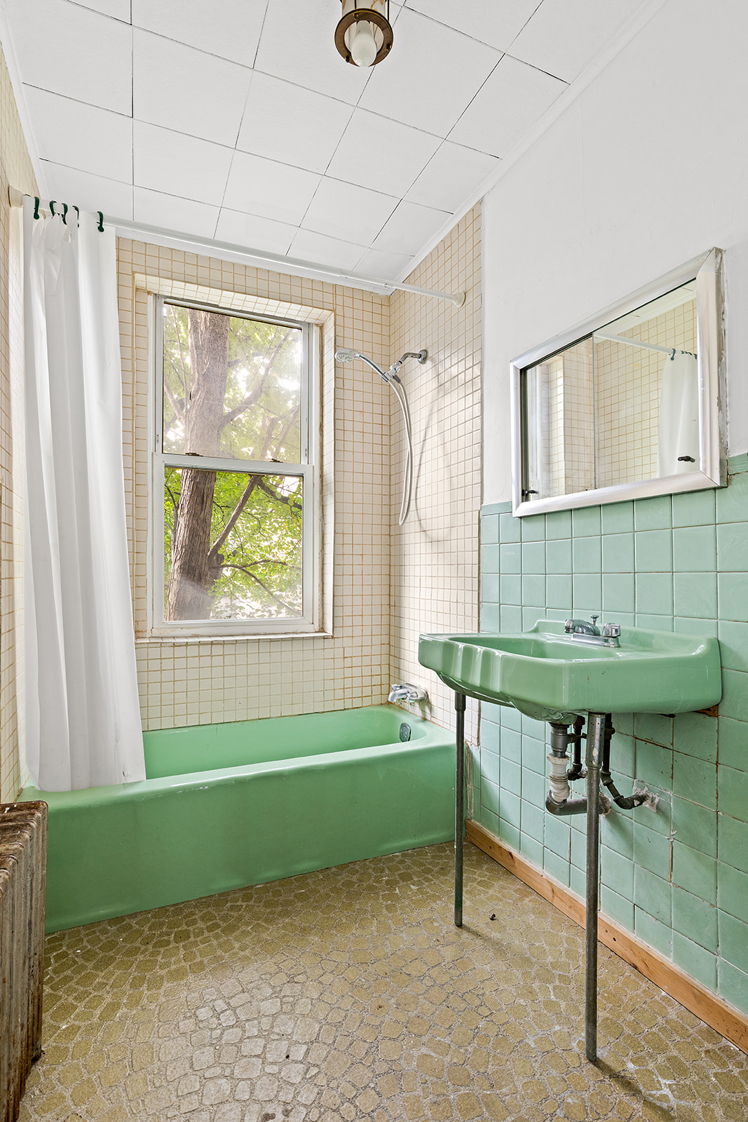 46 Willow Place Brooklyn, NY 11201 - Photo 16 of 31 a room with a window and a table