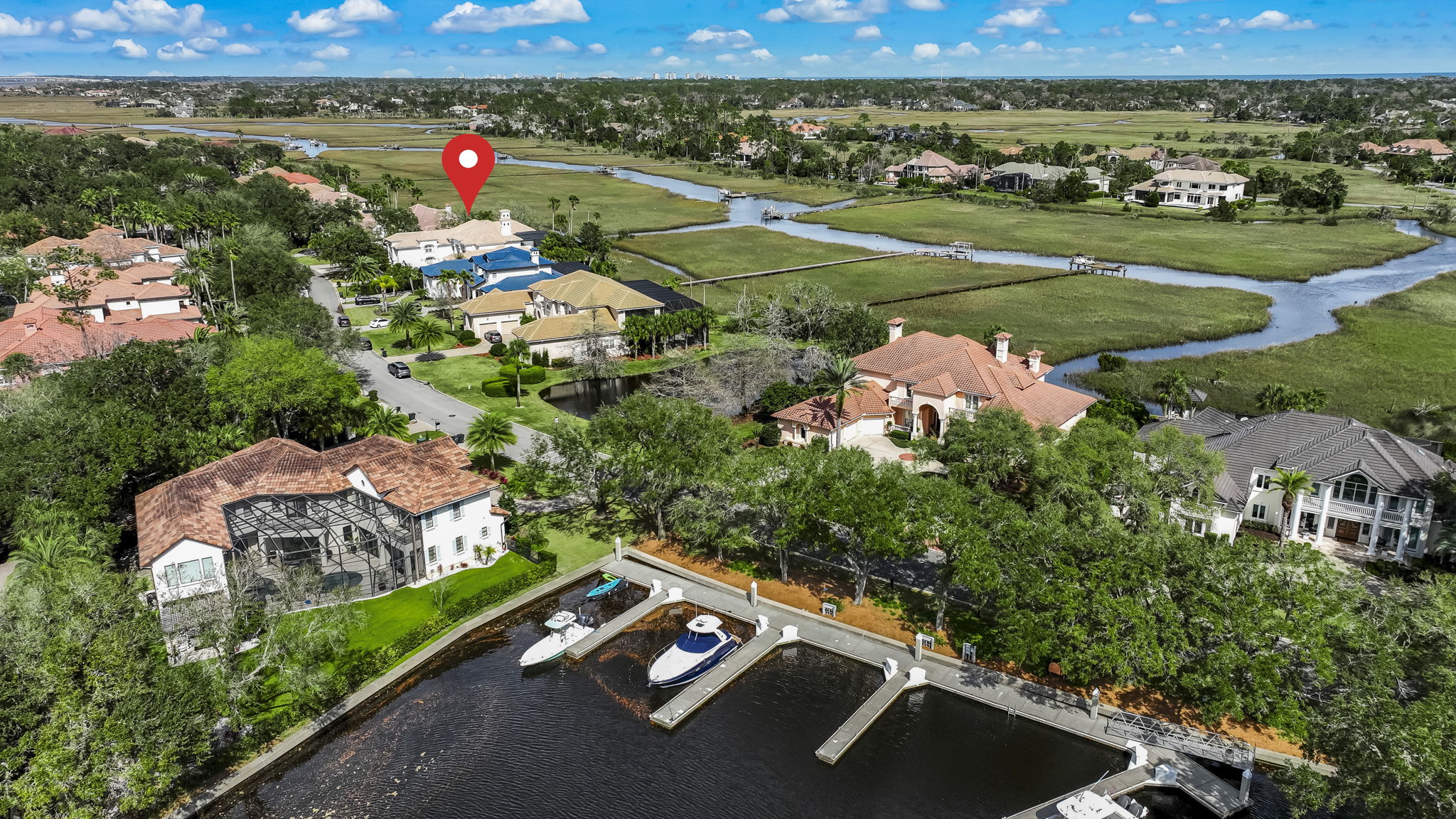24624 Harbour View Drive Ponte Vedra Beach, FL 32082 - Photo 145 of 186 an aerial view of a house with a yard lake view and mountain view in back