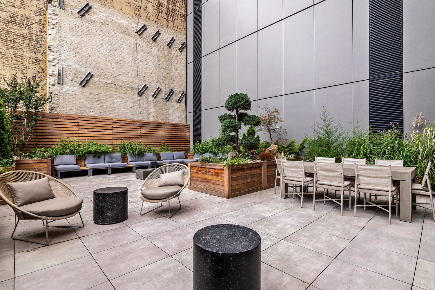 300 West 30th Street, Unit 11E Manhattan, NY 10001 - Photo 6 of 10 a outdoor space with lots of potted plants and a couch