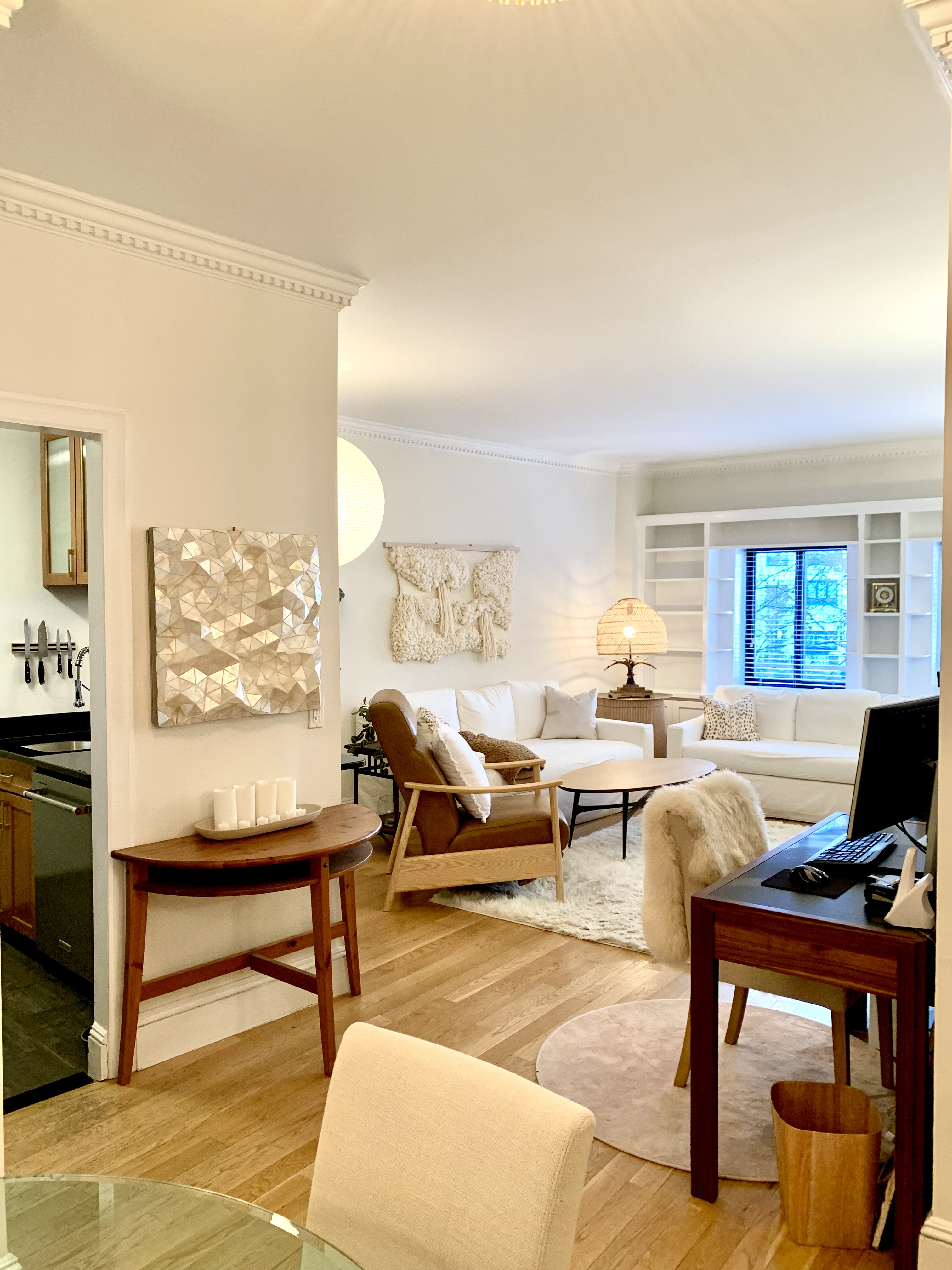 200 Rector Place, Unit 2C Manhattan, NY 10280 - Photo 2 of 19 a living room with furniture a rug and a window