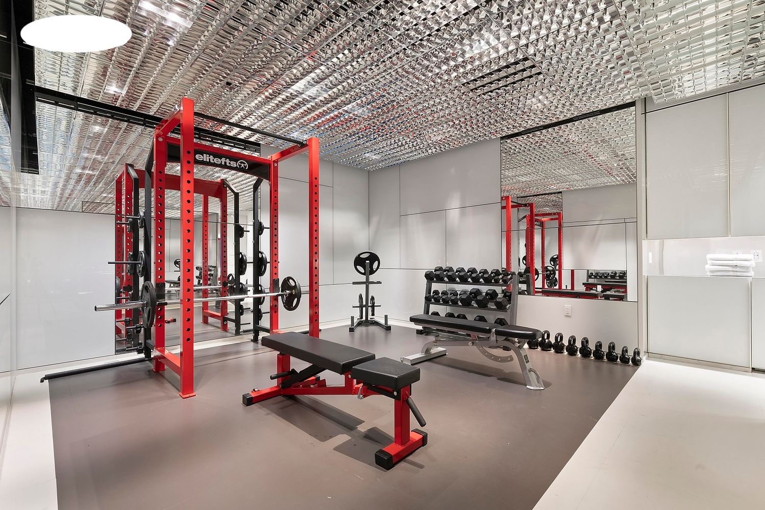 a gym room with gym equipment