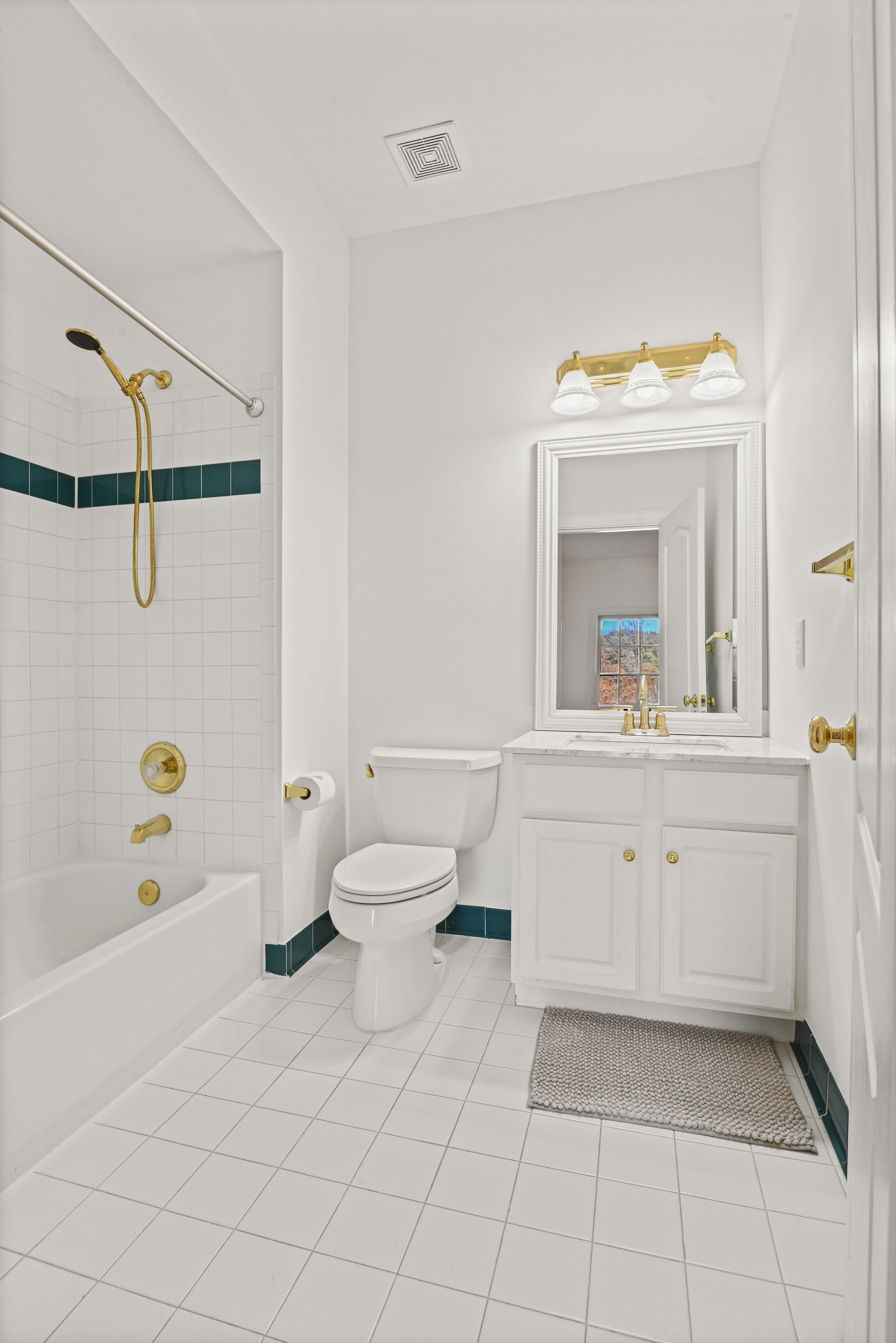 2628 Five Oaks Road Vienna, VA 22181 - Photo 31 of 40 a bathroom with a sink mirror vanity and toilet